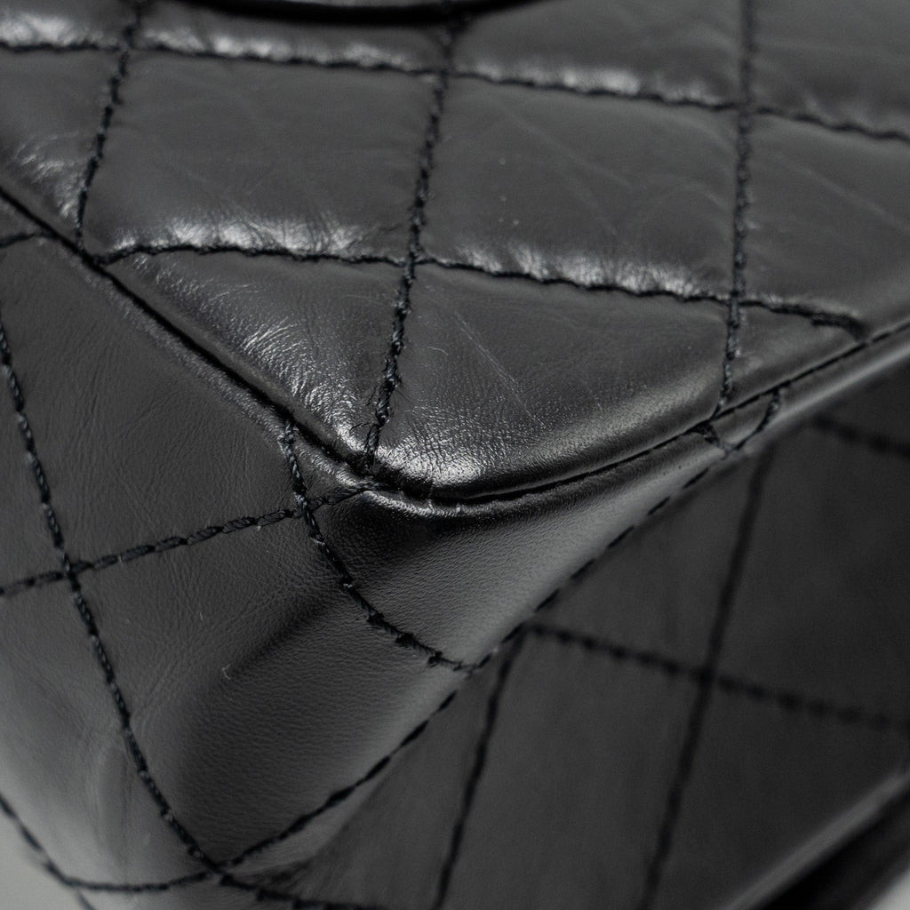 chanel-large-2-55-reissue-flap-bag-aged-calfskin-black-ghw-1