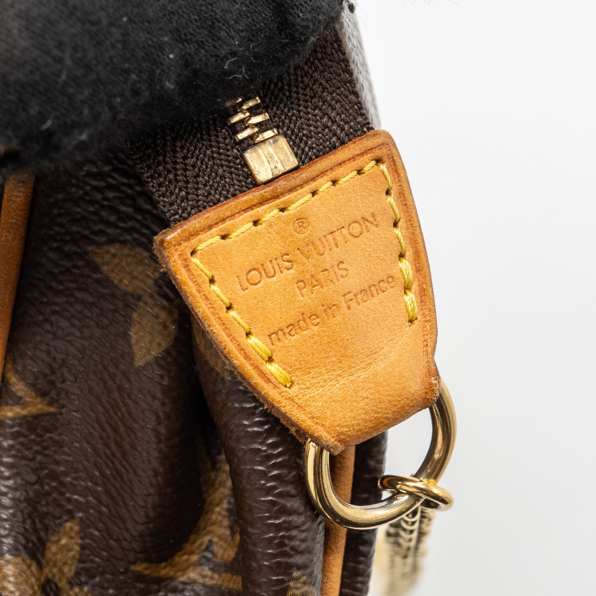 louis-vuitton-eva-pouch-monogram-canvas-ghw