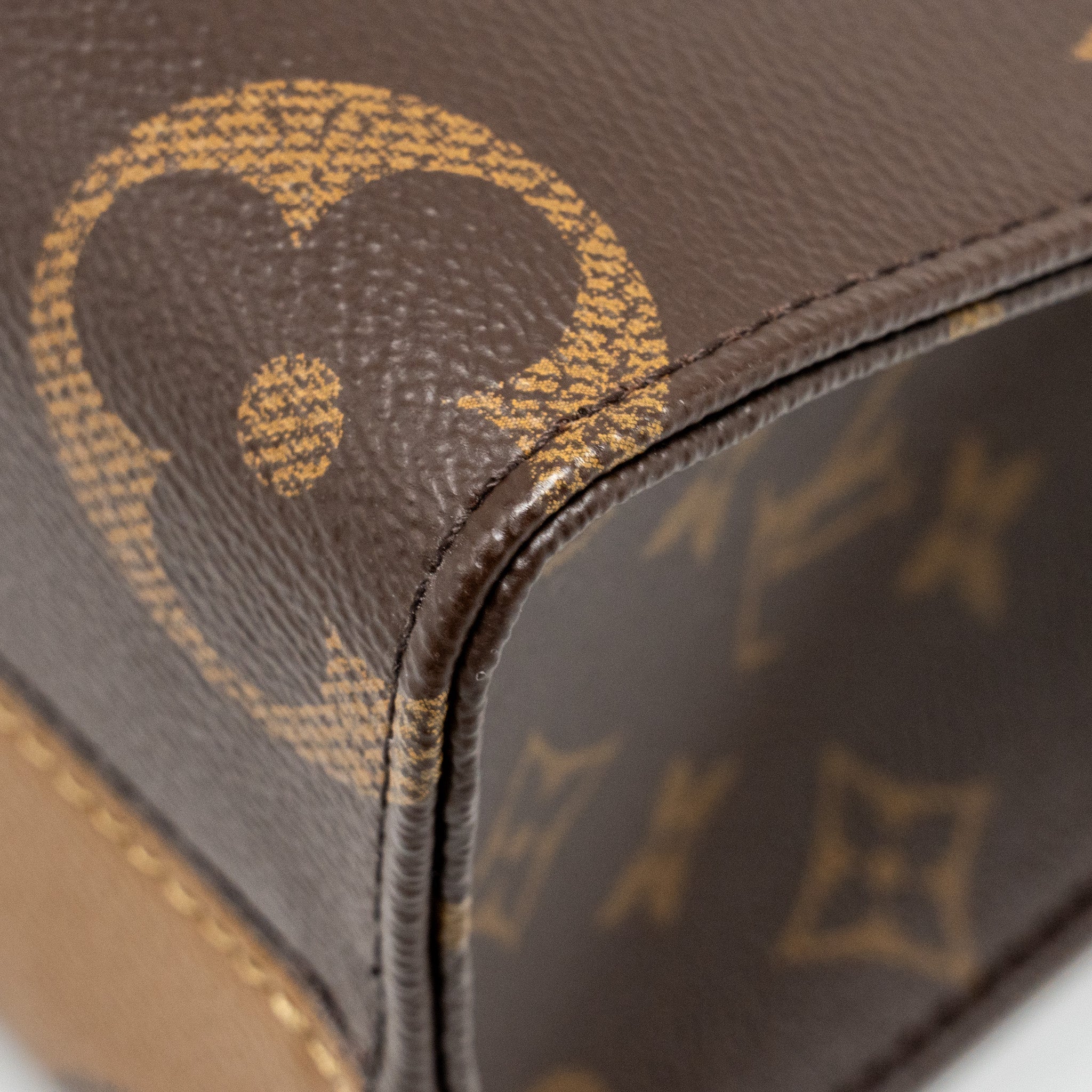 louis-vuitton-onthego-pm-monogram-reverse-canvas-ghw-copy