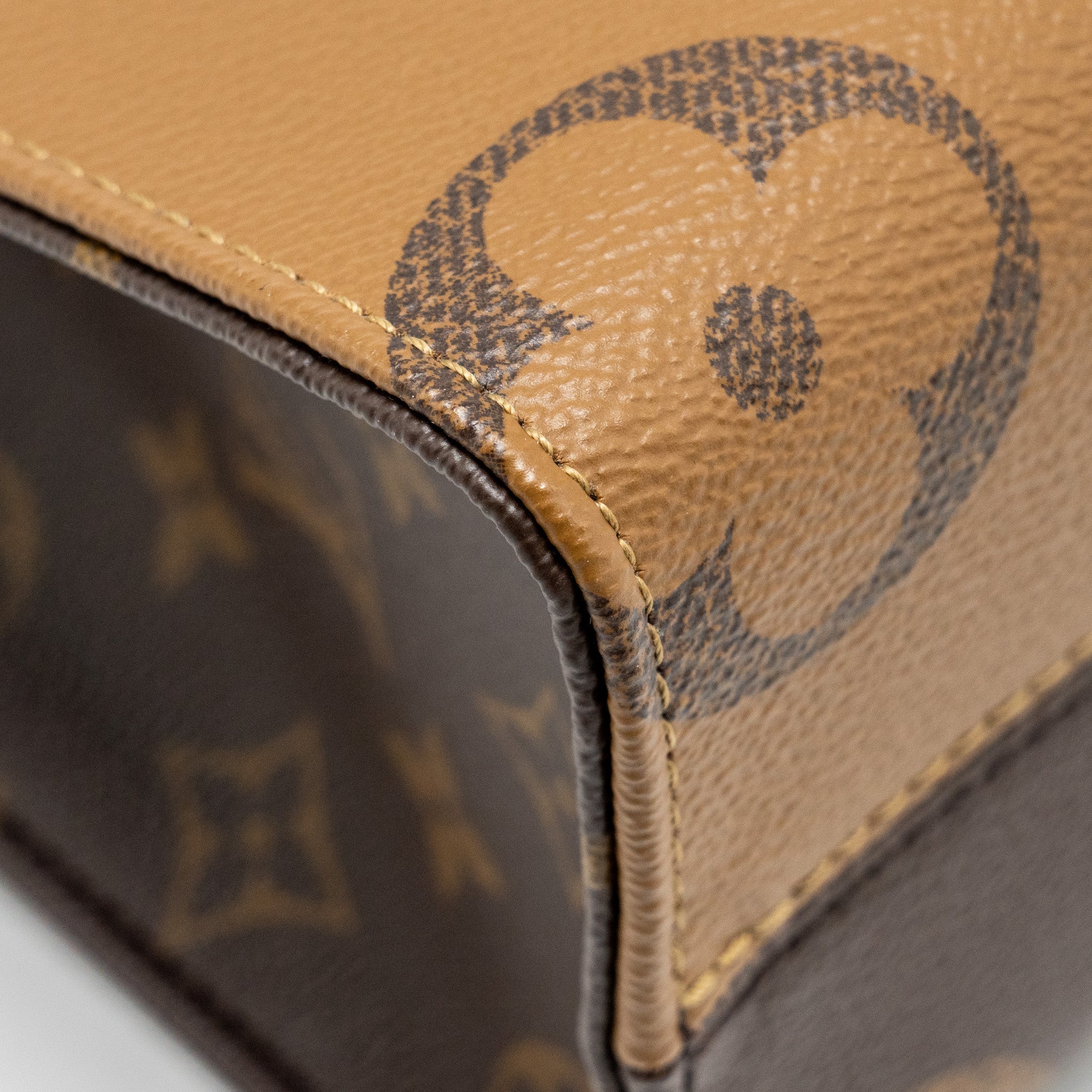 louis-vuitton-onthego-pm-monogram-reverse-canvas-ghw-copy