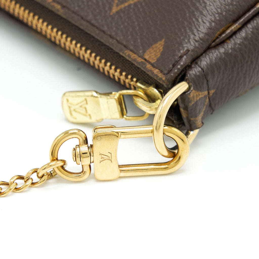 louis-vuitton-mini-pochette-monogram-canvas-ghw-1