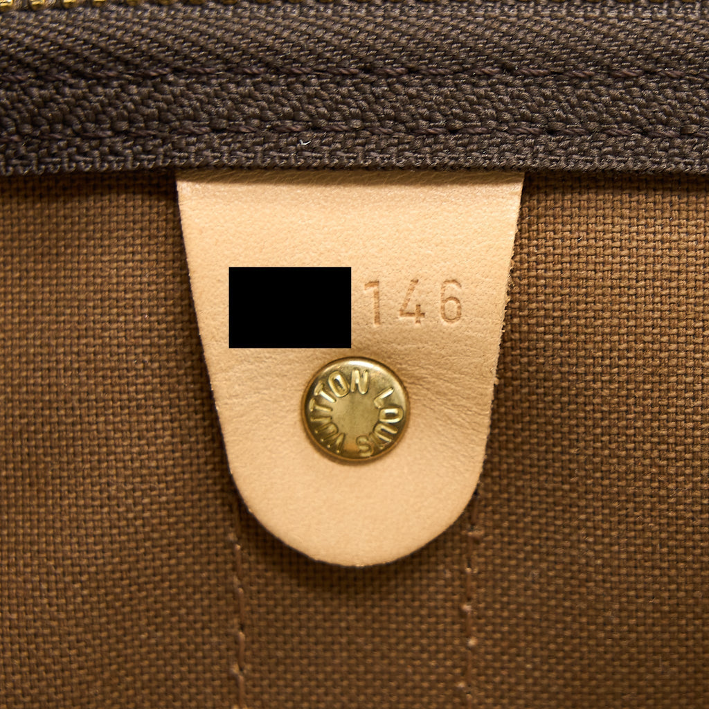louis-vuitton-keepall-bandoulire-50-monogram-canvas-ghw
