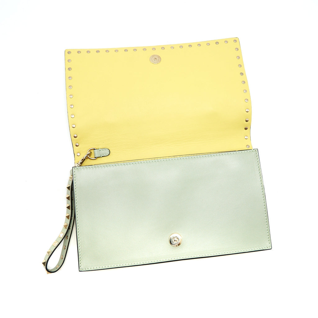 valentino-garavani-rockstud-leather-clutch-bag-multicolored