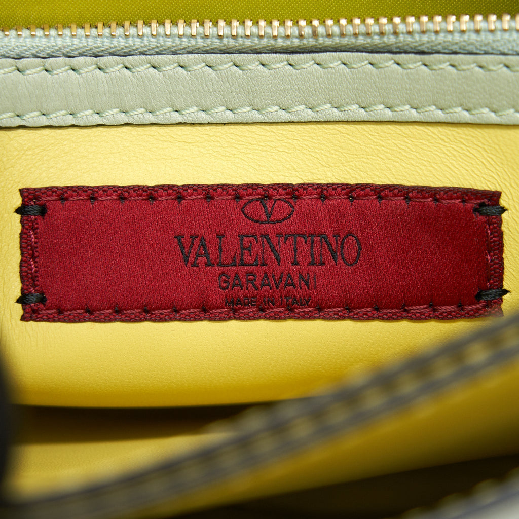 valentino-garavani-rockstud-leather-clutch-bag-multicolored