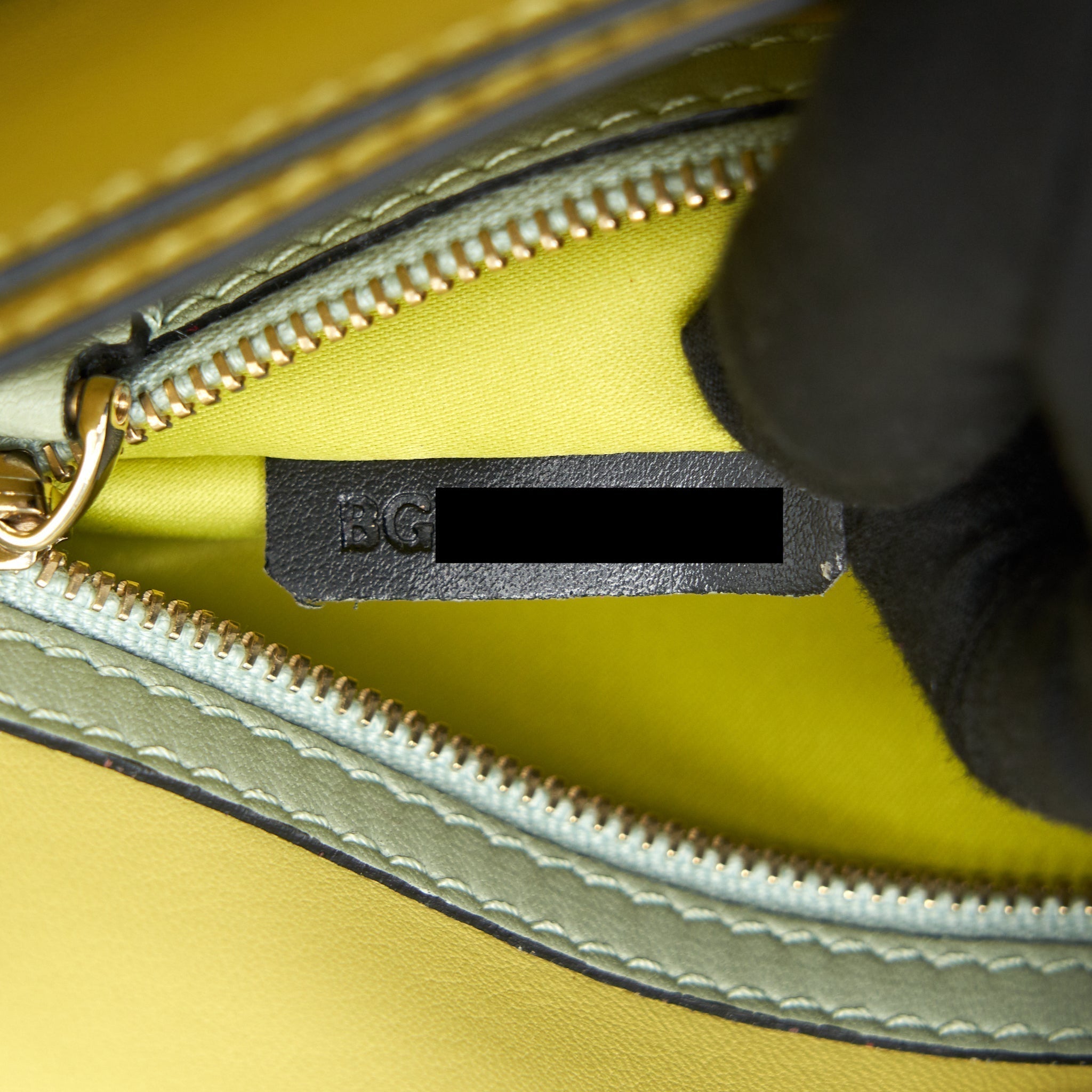 valentino-garavani-rockstud-leather-clutch-bag-multicolored