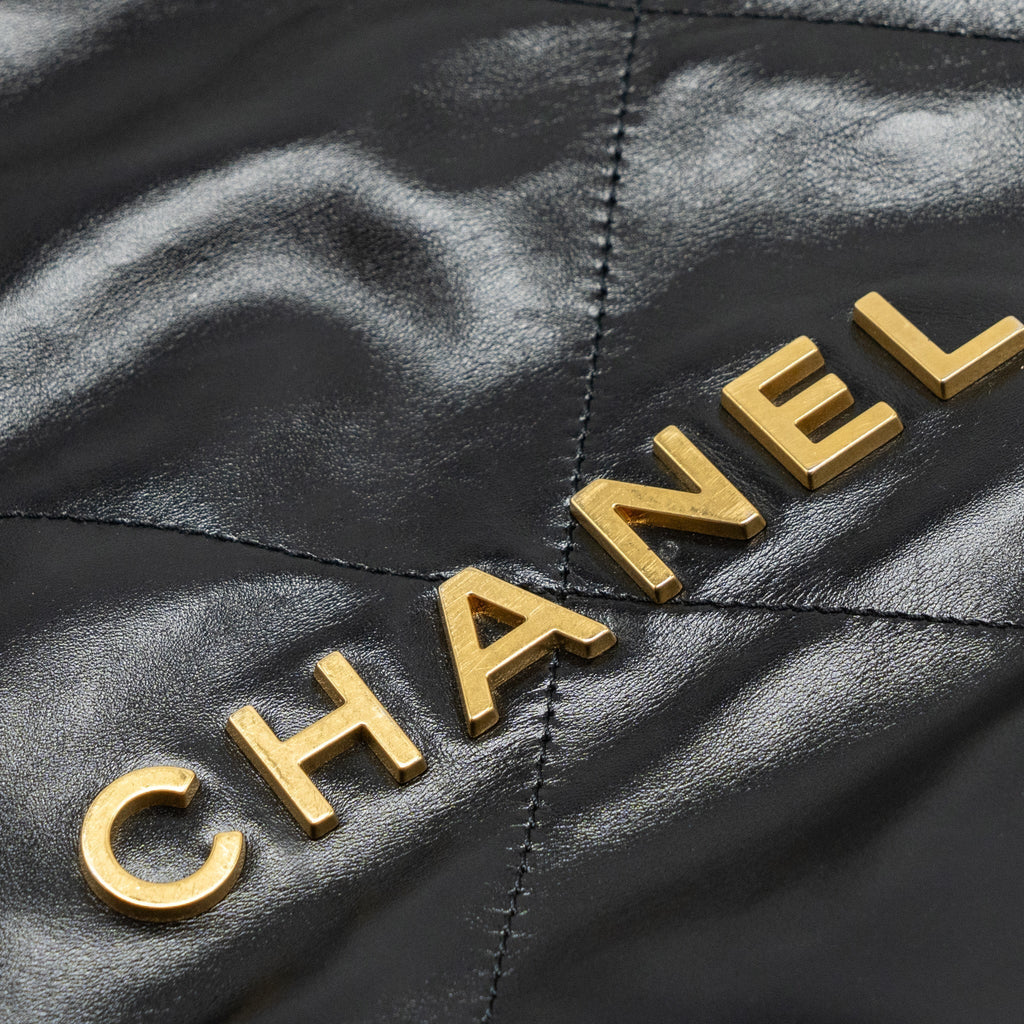 chanel-medium-22-bag-gold-letter-shiny-calfskin-black-ghwmicrochip-1