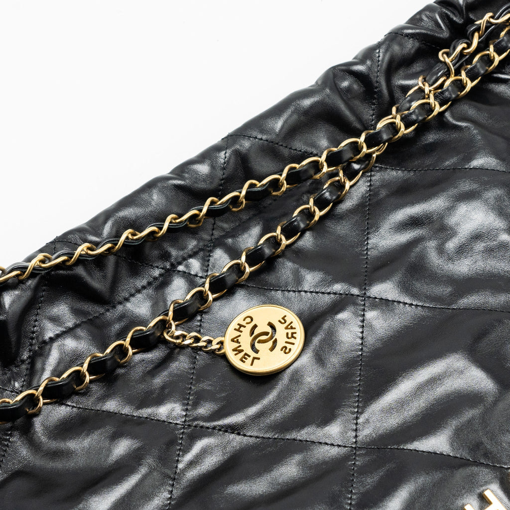 chanel-medium-22-bag-gold-letter-shiny-calfskin-black-ghwmicrochip-1
