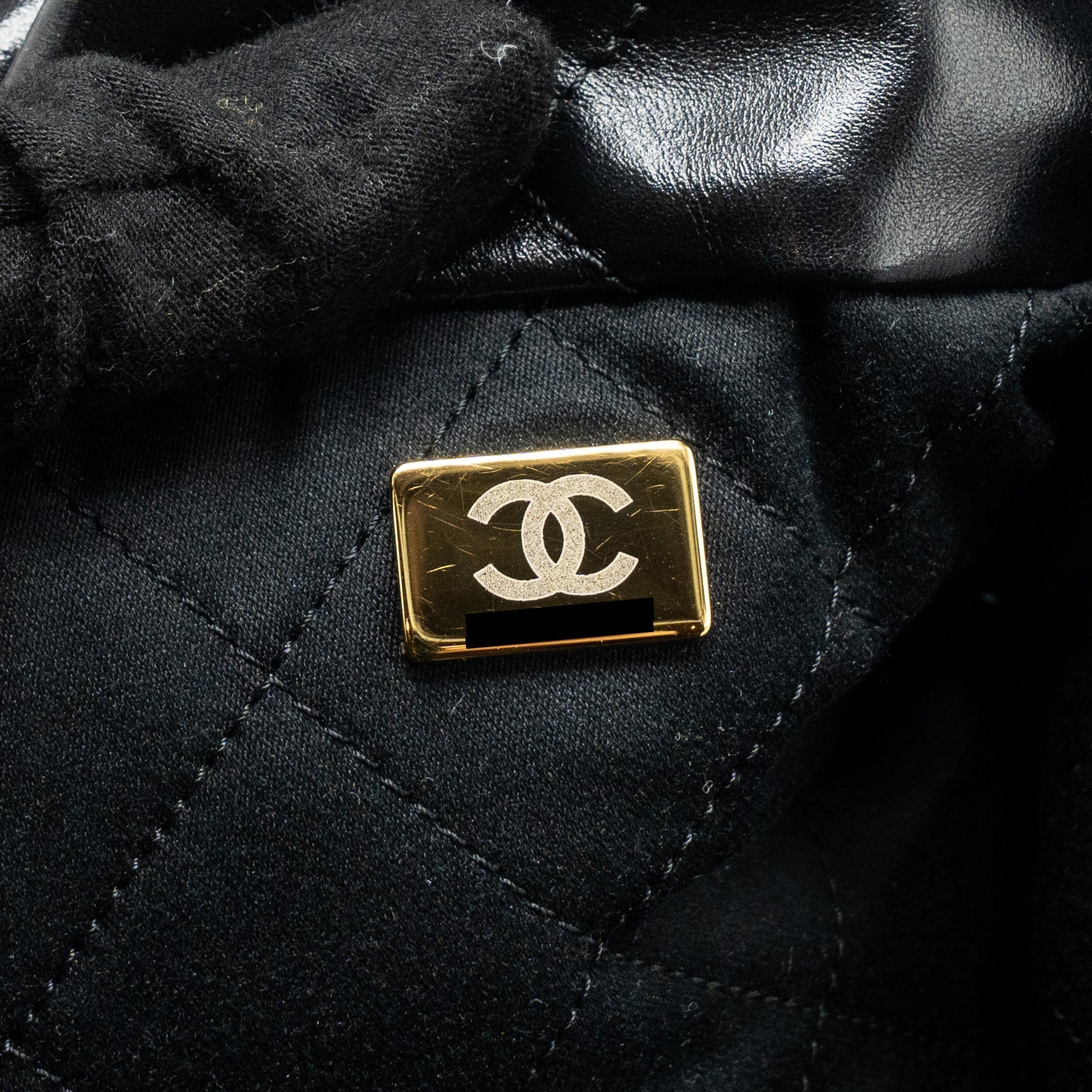 chanel-medium-22-bag-gold-letter-shiny-calfskin-black-ghwmicrochip-1