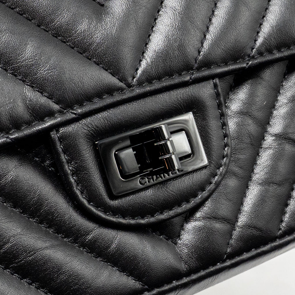 chanel-mini-2-55-reissue-flap-bag-chevron-aged-calfskin-so-black