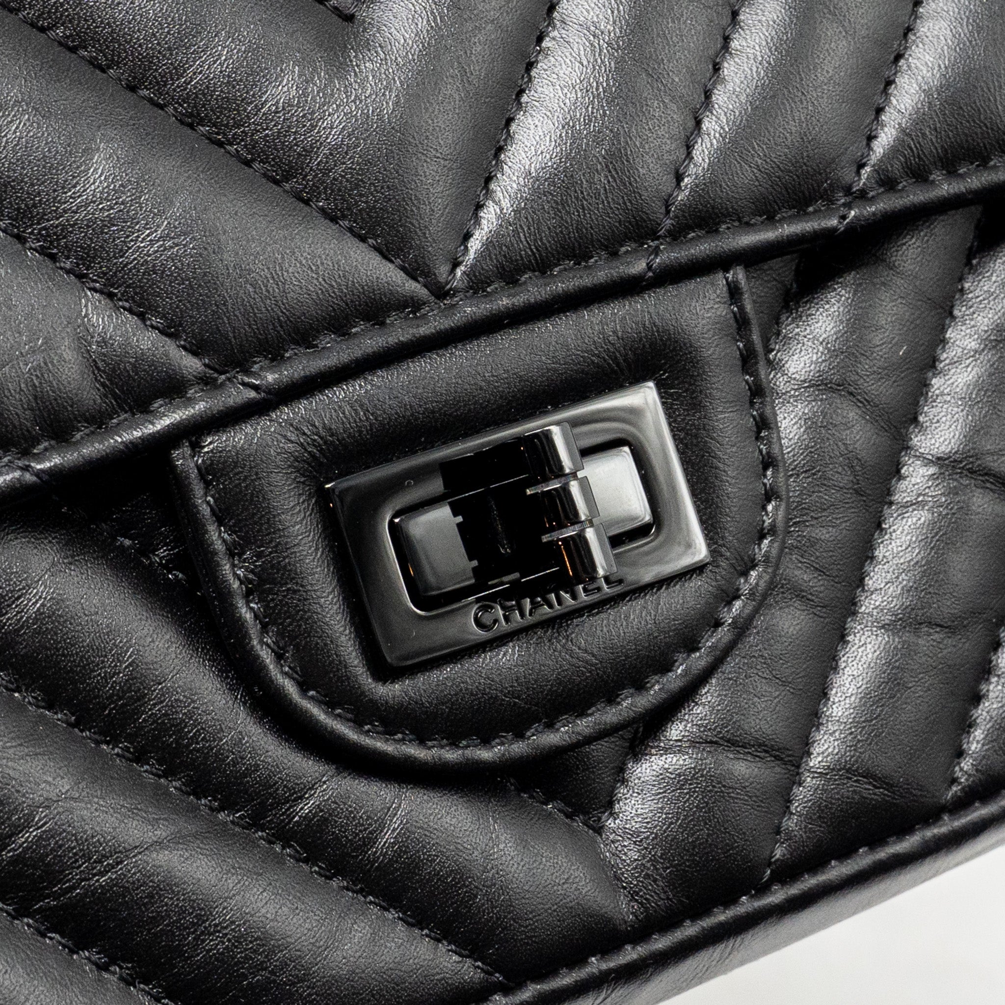 chanel-mini-2-55-reissue-flap-bag-chevron-aged-calfskin-so-black