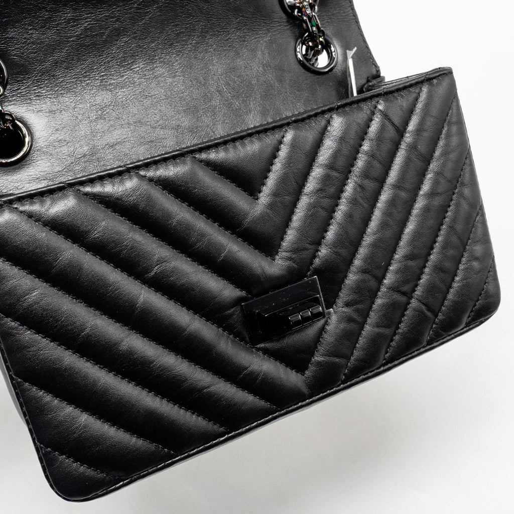 chanel-mini-2-55-reissue-flap-bag-chevron-aged-calfskin-so-black