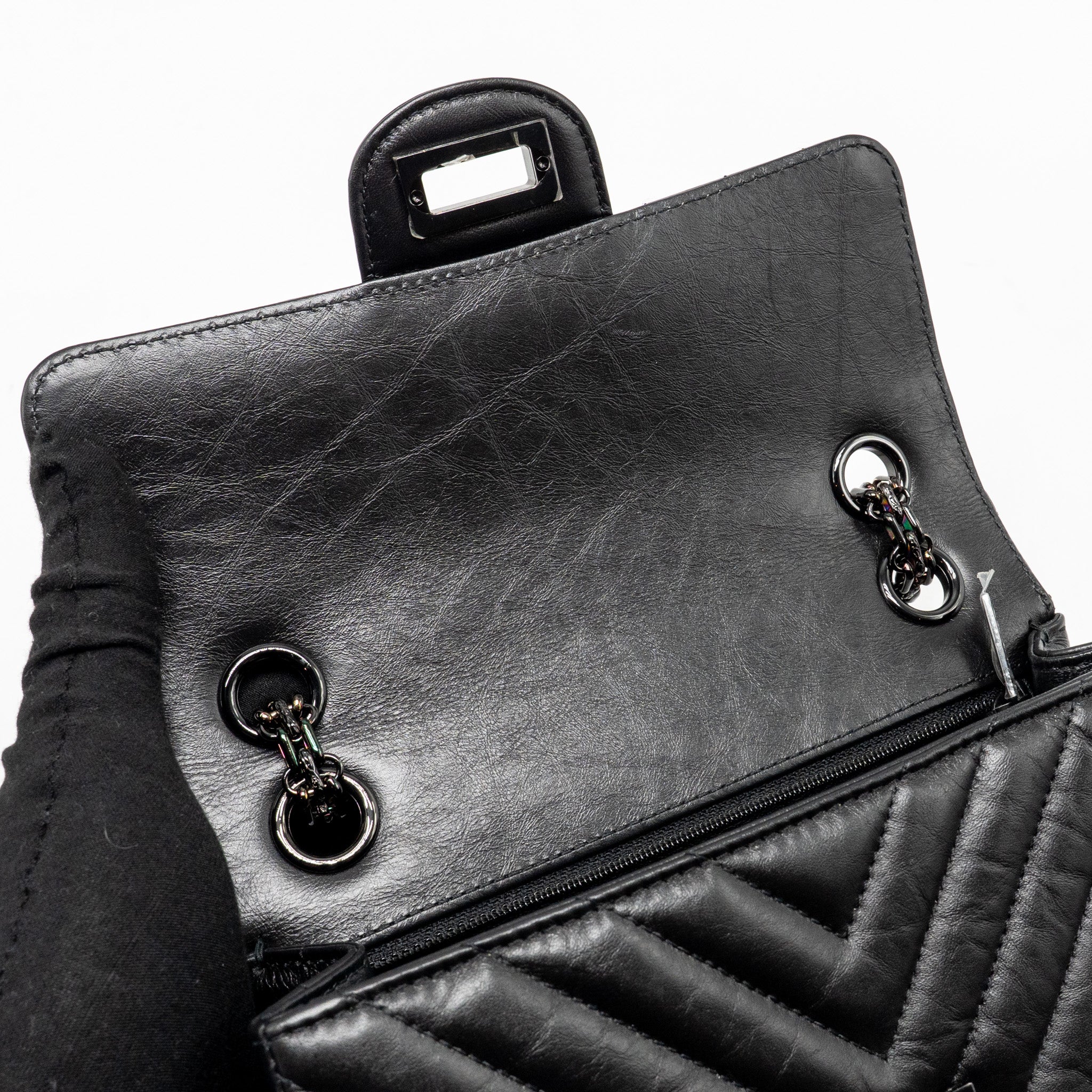 chanel-mini-2-55-reissue-flap-bag-chevron-aged-calfskin-so-black
