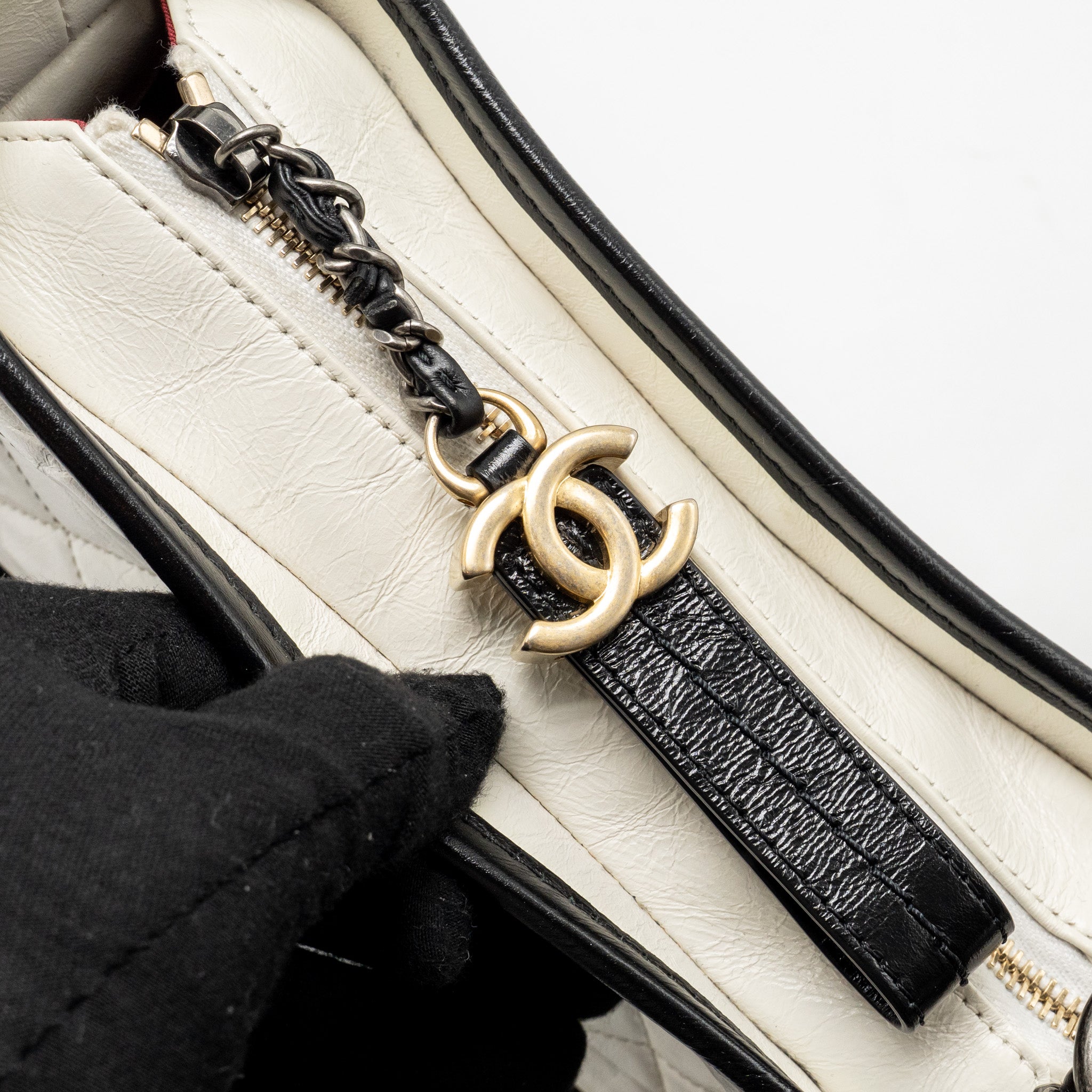 chanel-small-gabrielle-hobo-bag-aged-calfskin-white-black-multicolour-hardware-1