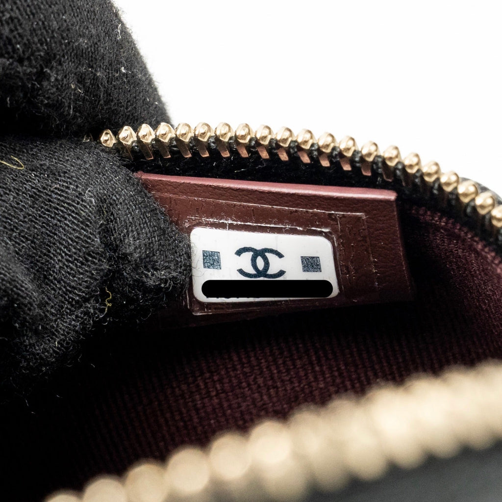 chanel-25p-cc-top-handle-vanity-bag-caviar-black-lghw-microchip-1