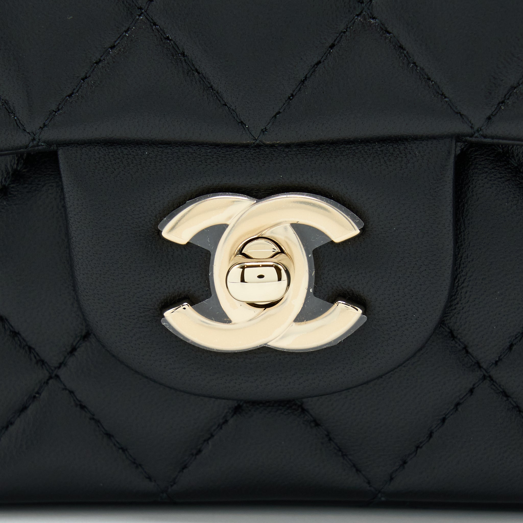 chanel-22a-top-handle-mini-rectangular-flap-bag-lambskin-black-ghw-microchip-1