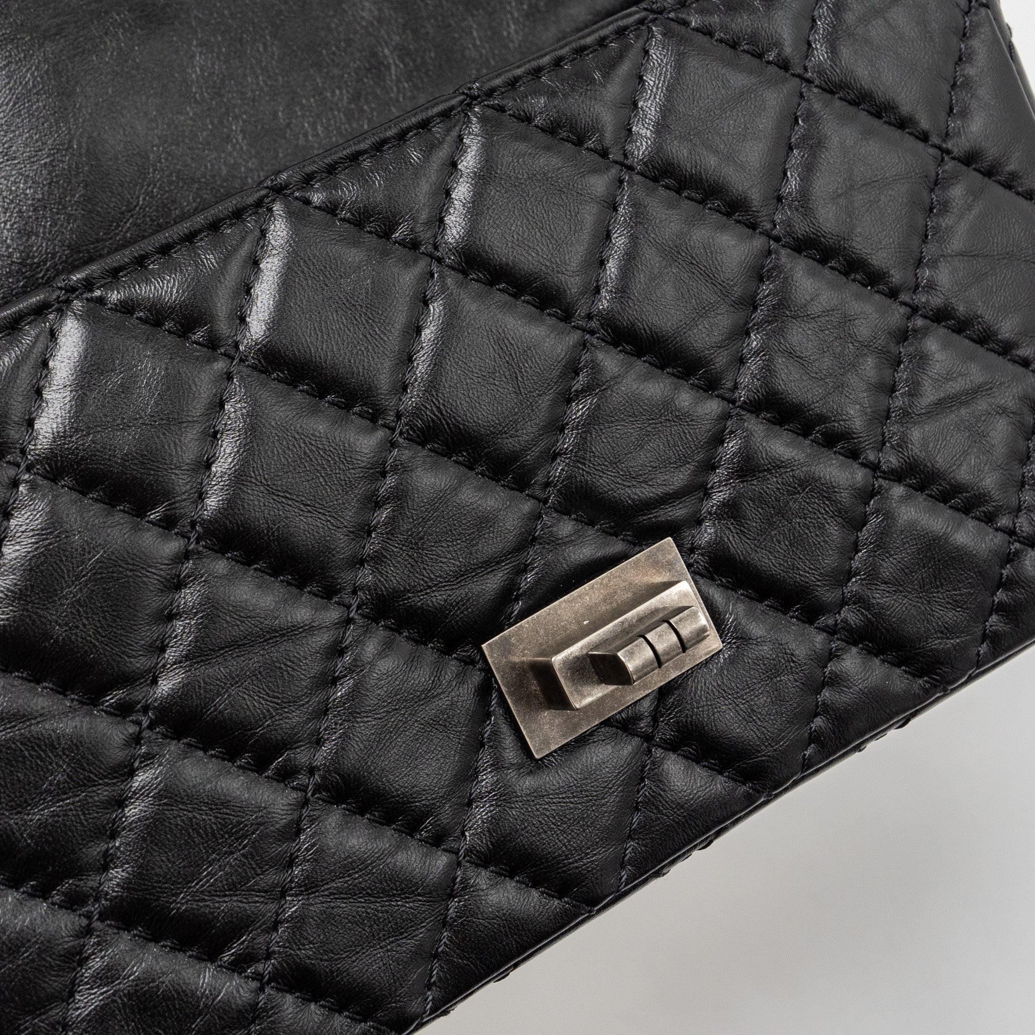 chanel-mini-2-55-reissue-flap-bag-aged-calfskin-black-ruthenium-hardware