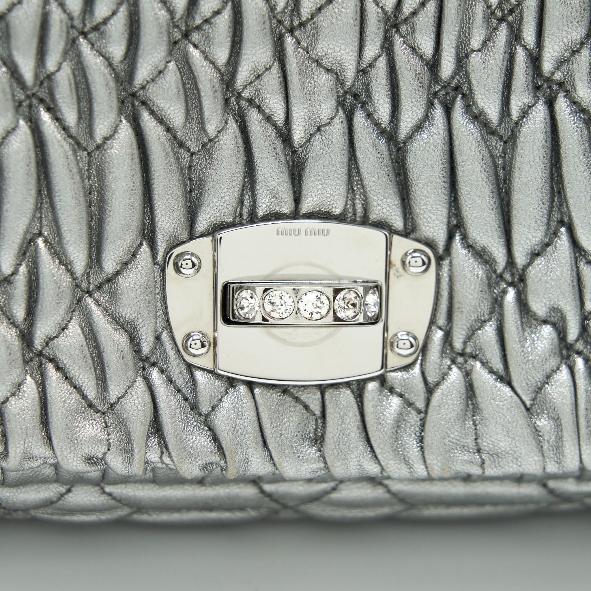 miu-miu-iconic-crystal-cloque-nappa-silver-shw