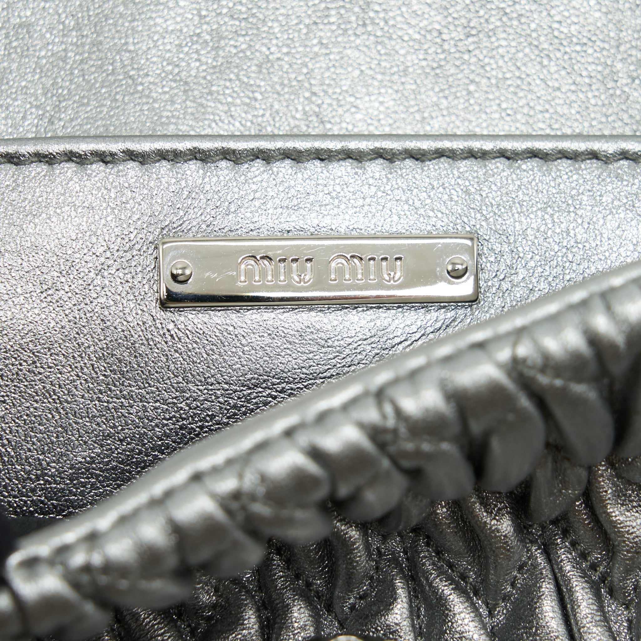 miu-miu-iconic-crystal-cloque-nappa-silver-shw