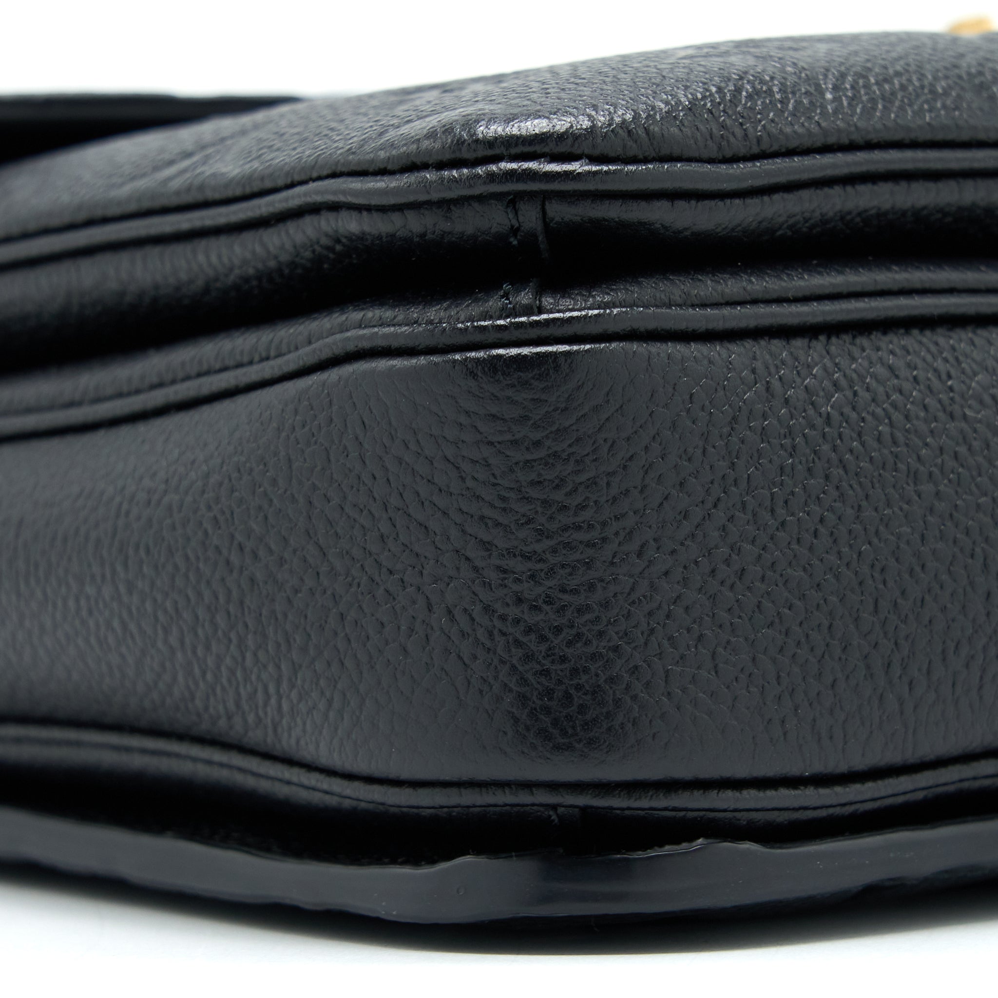louis-vuitton-pochette-metis-monogram-empreinte-leather-black-ghw