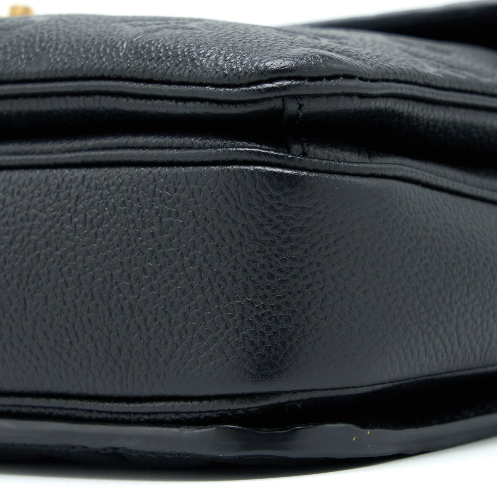 louis-vuitton-pochette-metis-monogram-empreinte-leather-black-ghw