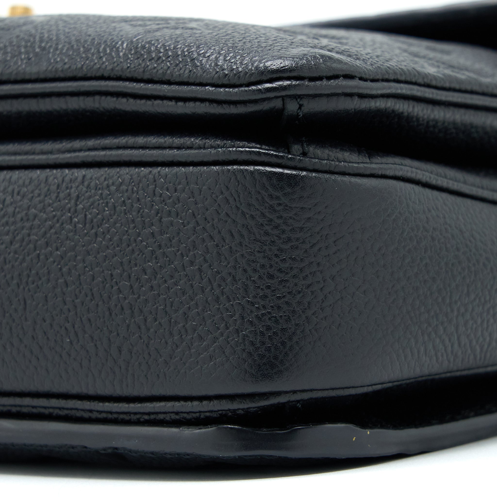 louis-vuitton-pochette-metis-monogram-empreinte-leather-black-ghw