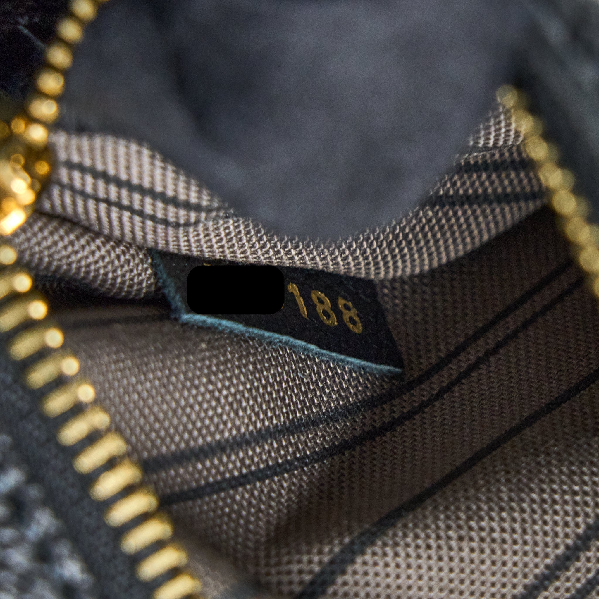 louis-vuitton-pochette-metis-monogram-empreinte-leather-black-ghw