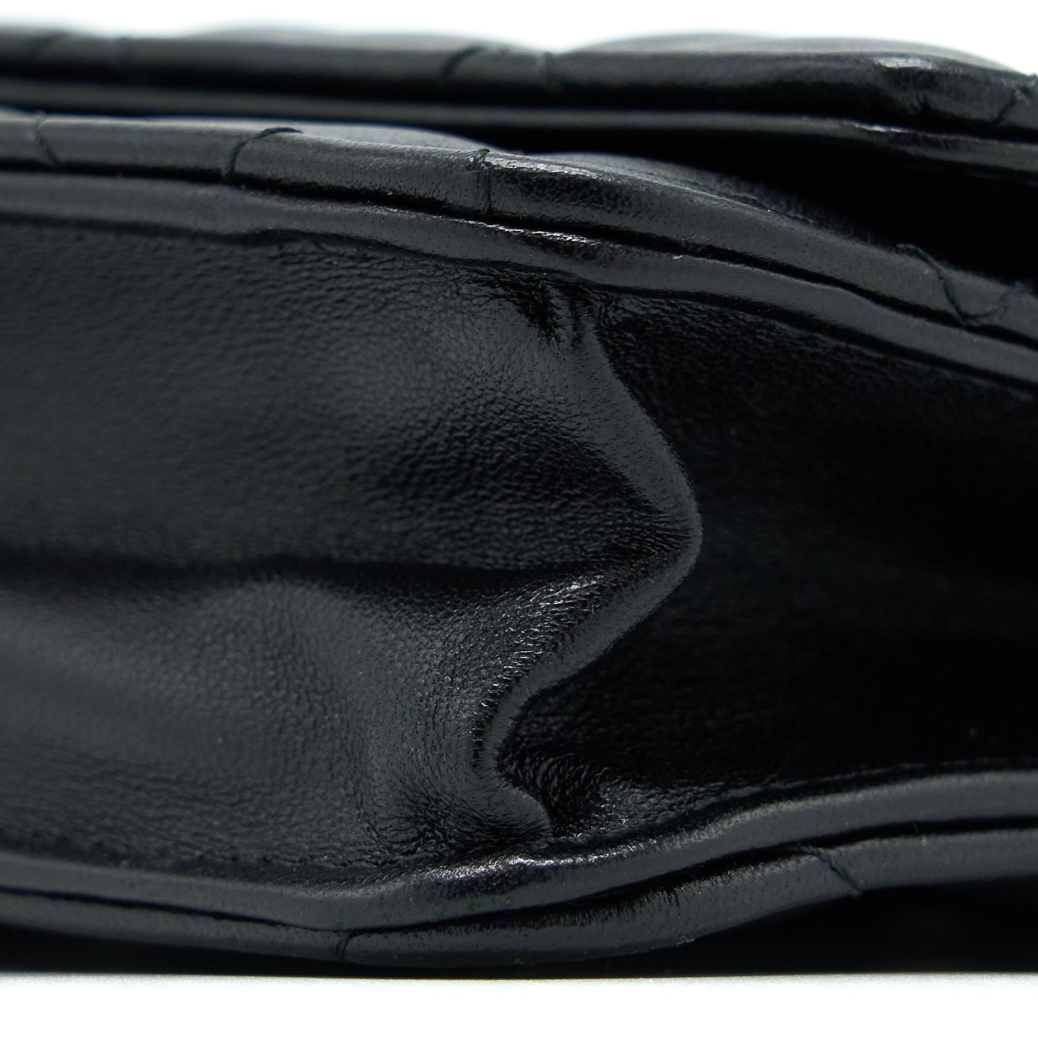 chanel-quilted-wallet-on-chain-with-camellia-chain-lambskin-black-lghw