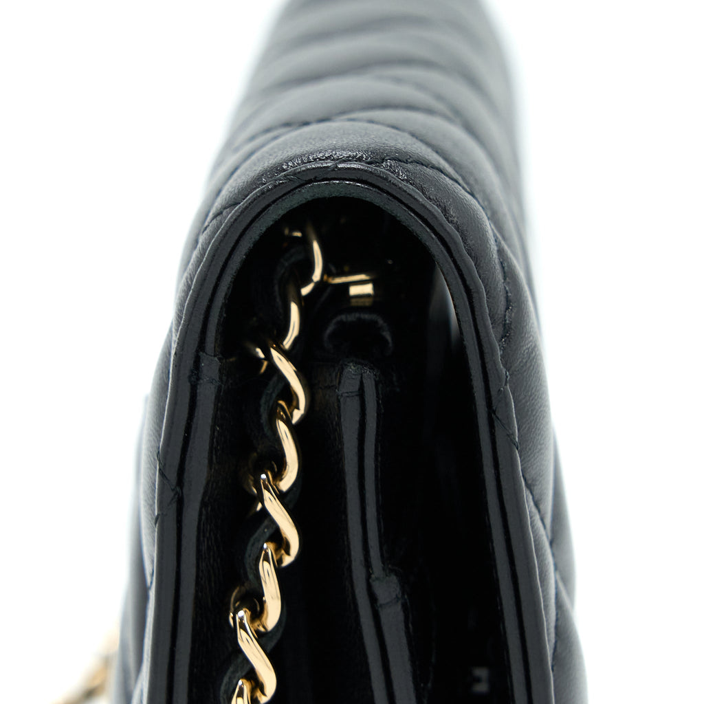 chanel-quilted-wallet-on-chain-with-camellia-chain-lambskin-black-lghw