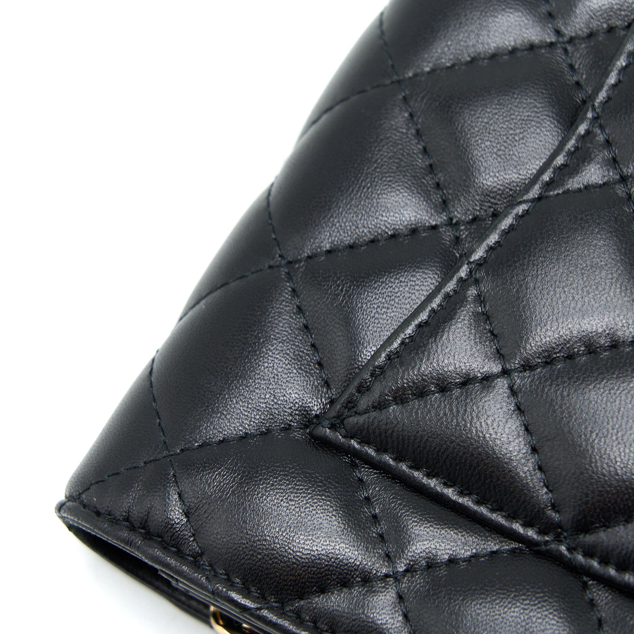chanel-quilted-wallet-on-chain-with-camellia-chain-lambskin-black-lghw