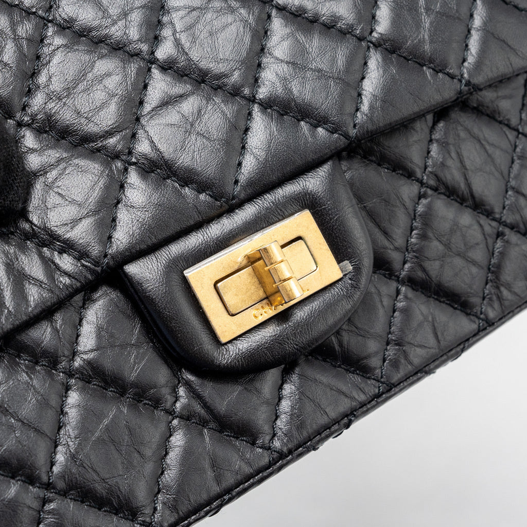 chanel-mini-2-55-reissue-flap-bag-aged-calfskin-black-ghw-1