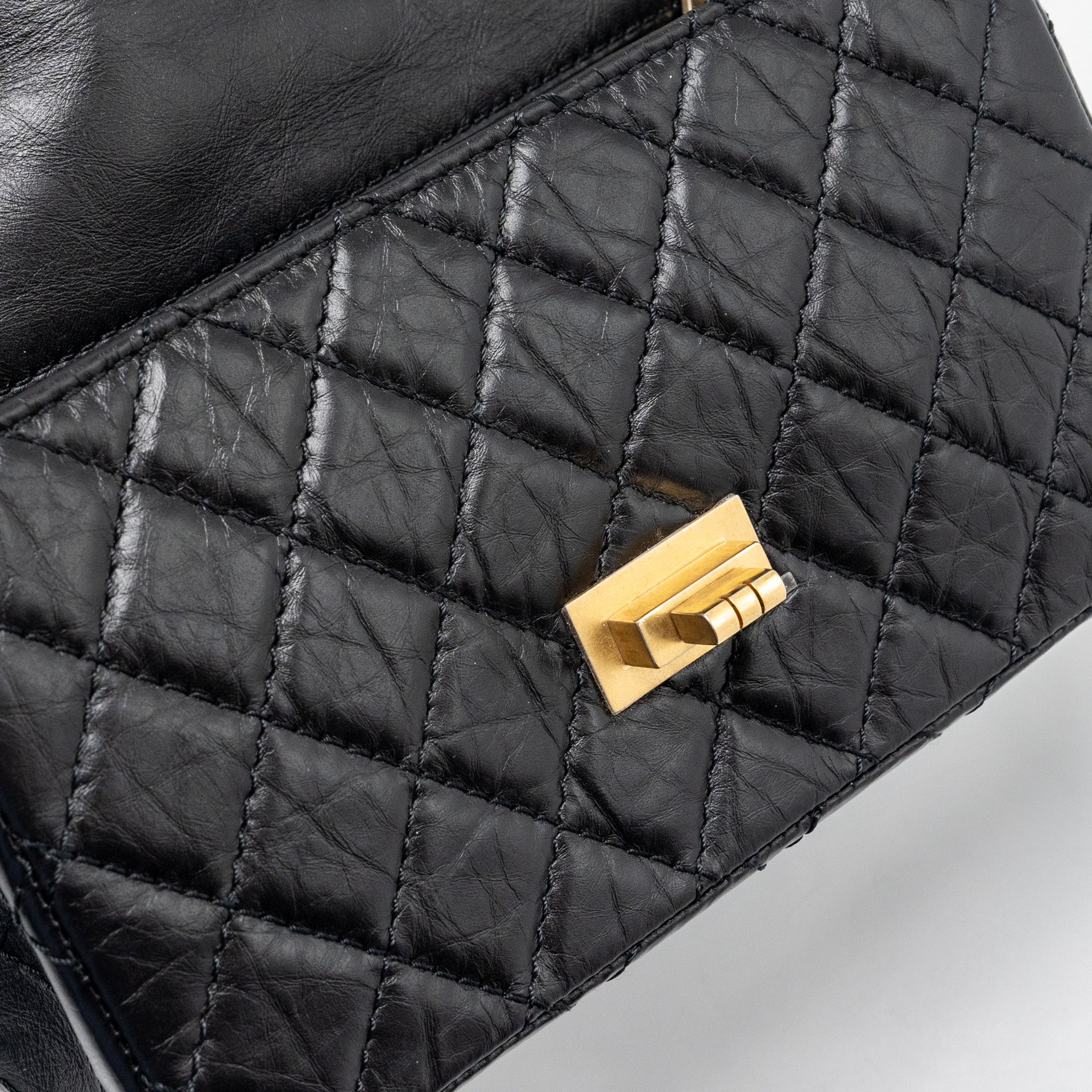 chanel-mini-2-55-reissue-flap-bag-aged-calfskin-black-ghw-1