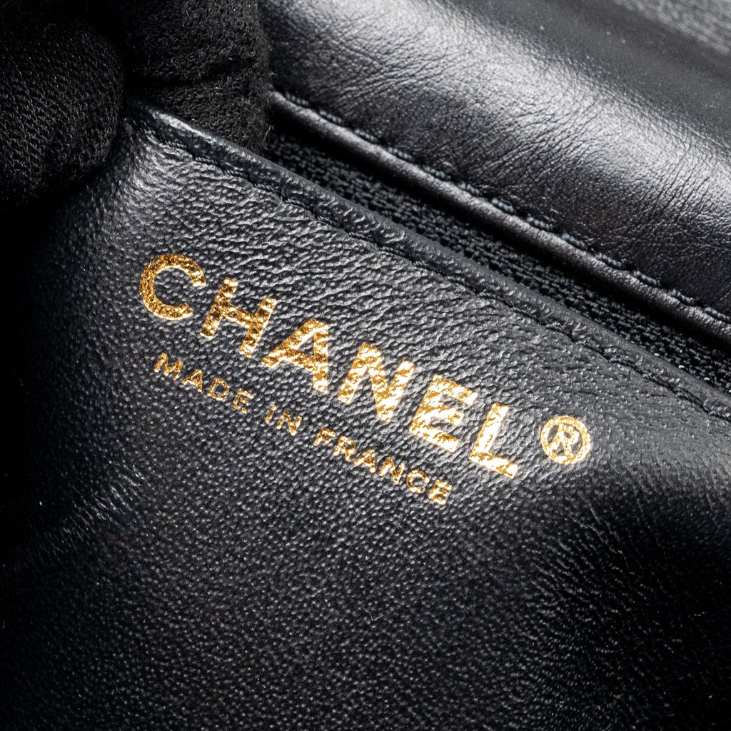 chanel-mini-2-55-reissue-flap-bag-aged-calfskin-black-ghw-1