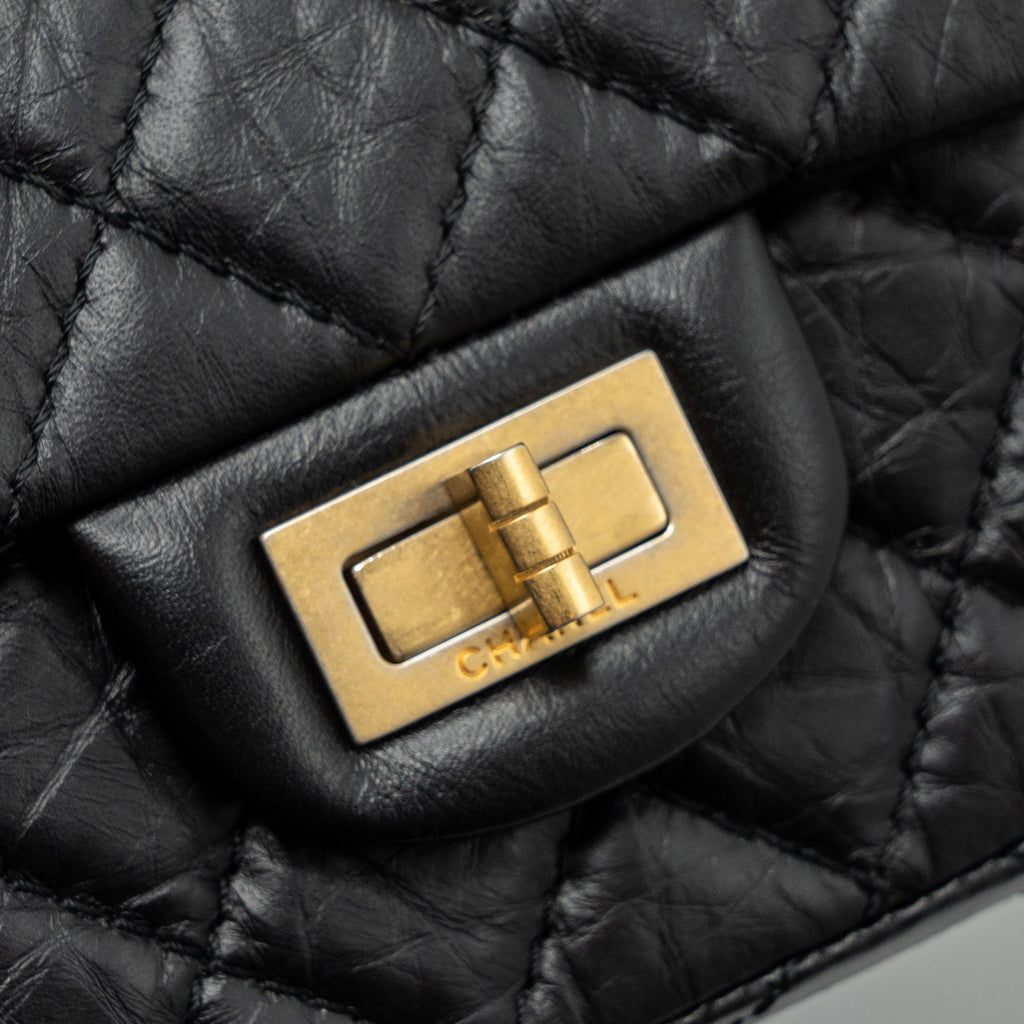 chanel-mini-2-55-reissue-flap-bag-aged-calfskin-black-ghw