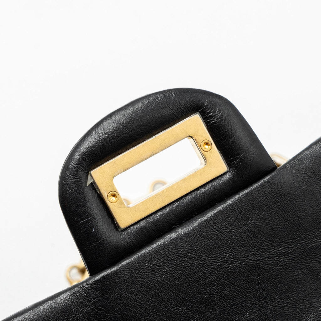 chanel-mini-2-55-reissue-flap-bag-aged-calfskin-black-ghw