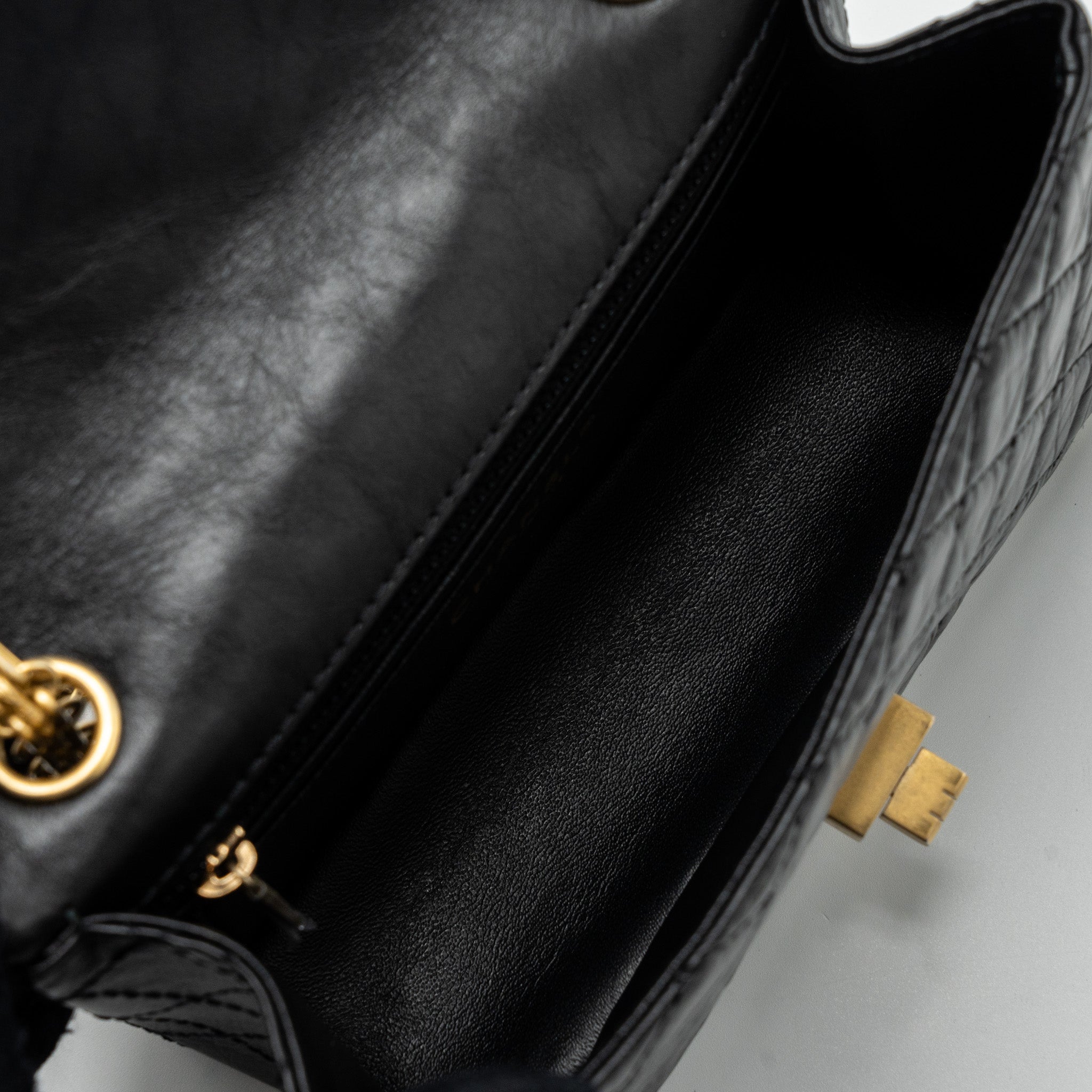 chanel-mini-2-55-reissue-flap-bag-aged-calfskin-black-ghw