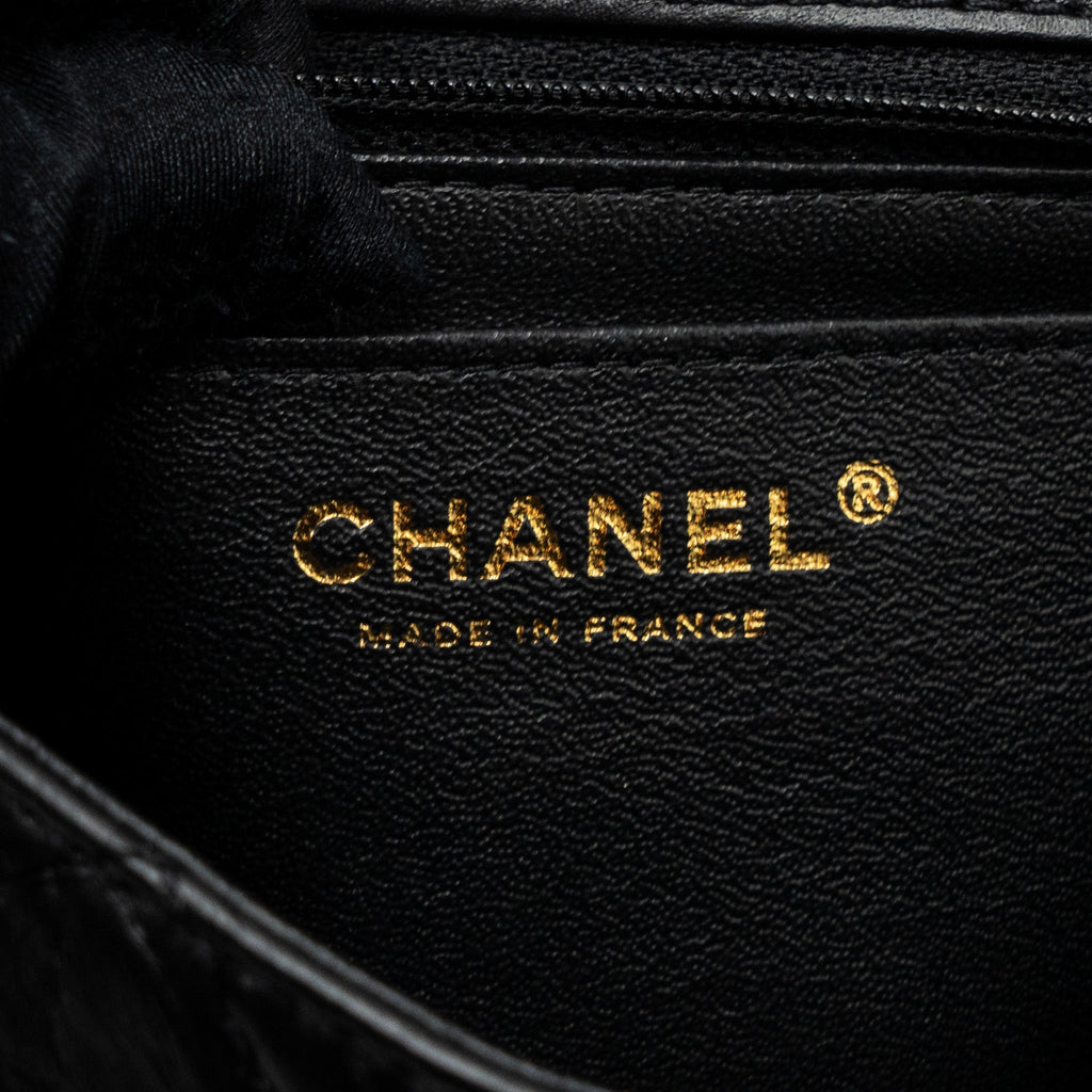 chanel-mini-2-55-reissue-flap-bag-aged-calfskin-black-ghw