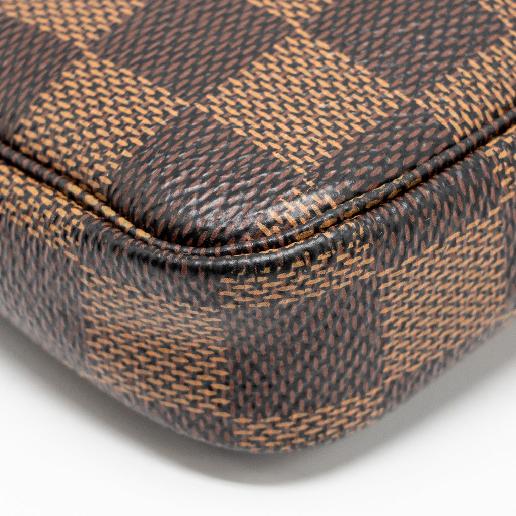 louis-vuitton-mini-pochette-accessories-damier-ebene-ghw-1