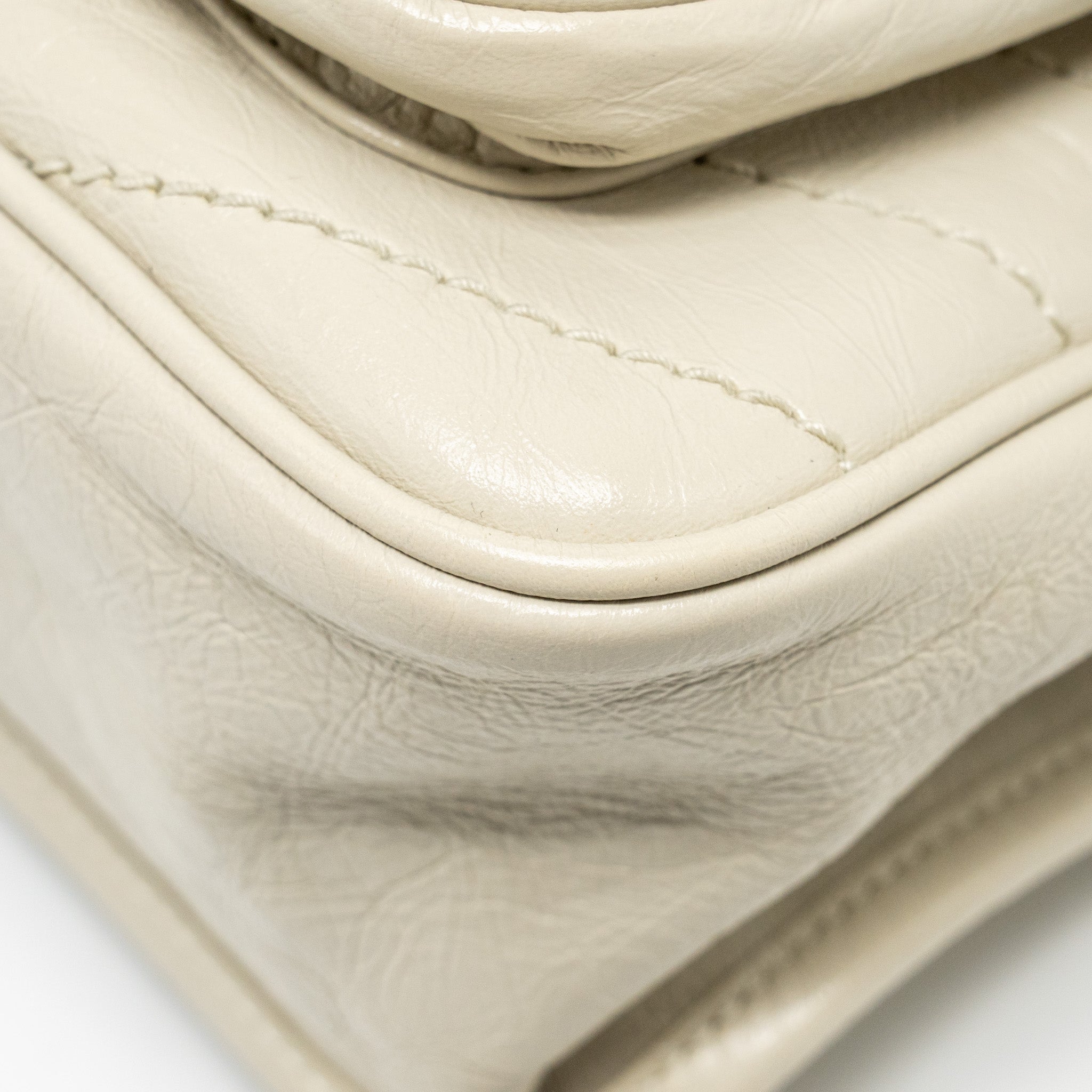 saint-laurent-ysl-medium-niki-calfskin-white-shw