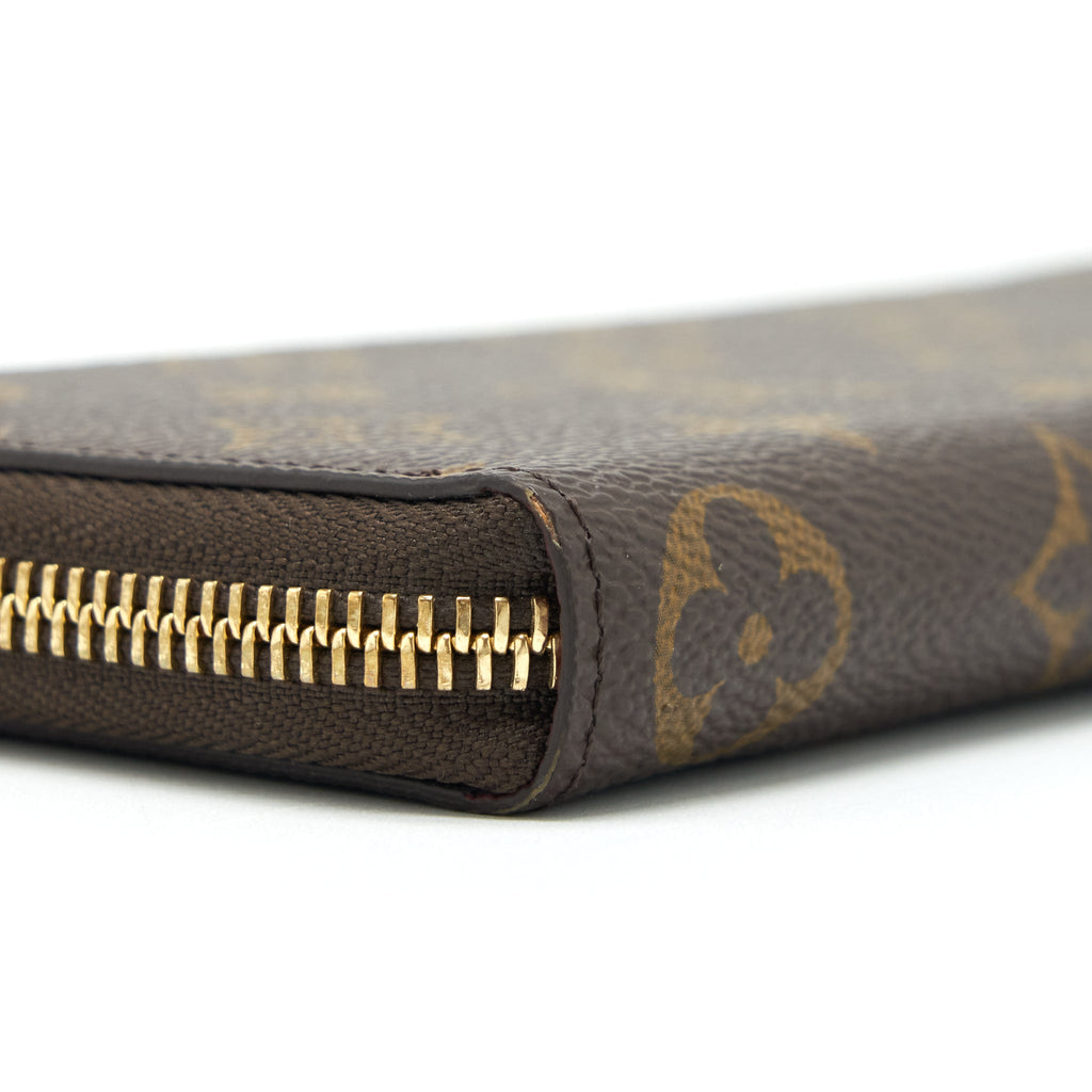 louis-vuitton-clemence-long-wallet-monogram-canvas-fuchsia
