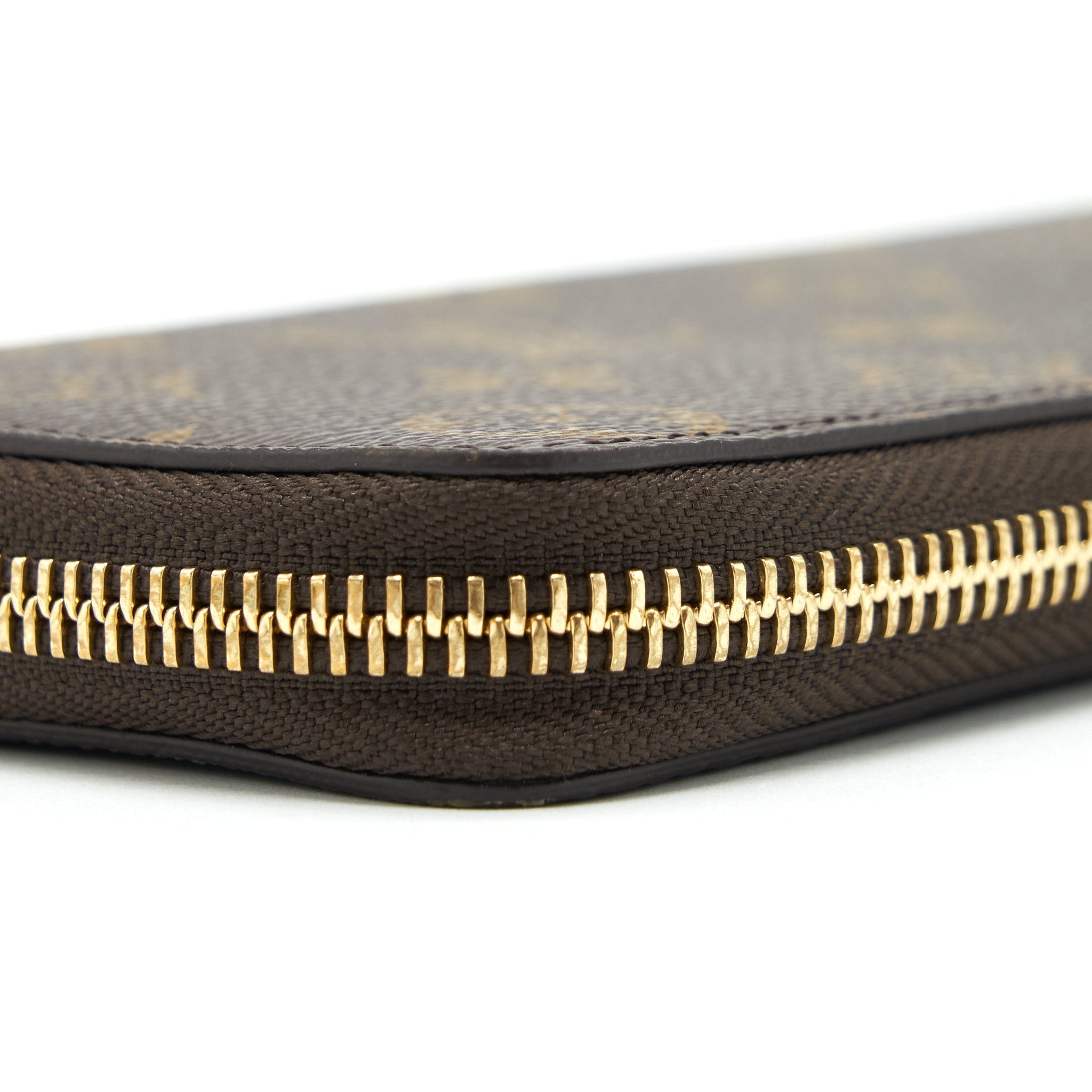 louis-vuitton-clemence-long-wallet-monogram-canvas-fuchsia