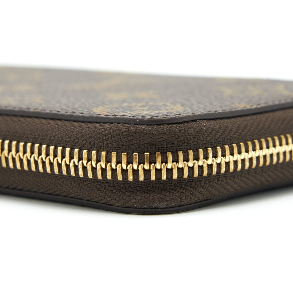 louis-vuitton-clemence-long-wallet-monogram-canvas-fuchsia