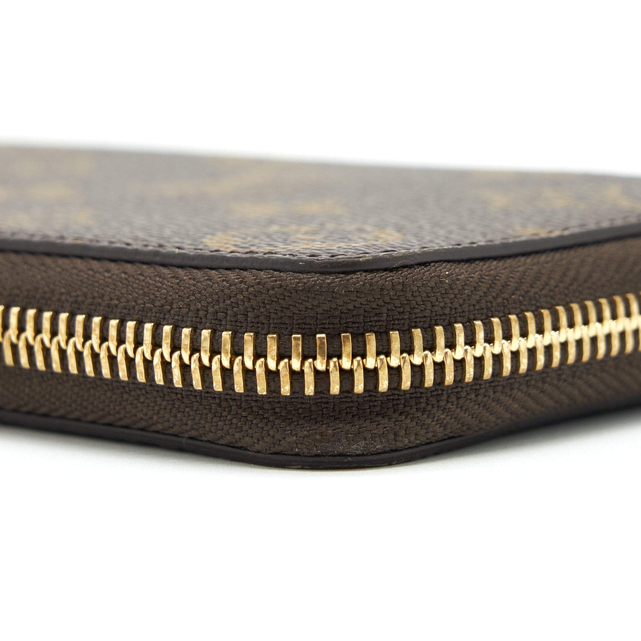 louis-vuitton-clemence-long-wallet-monogram-canvas-fuchsia