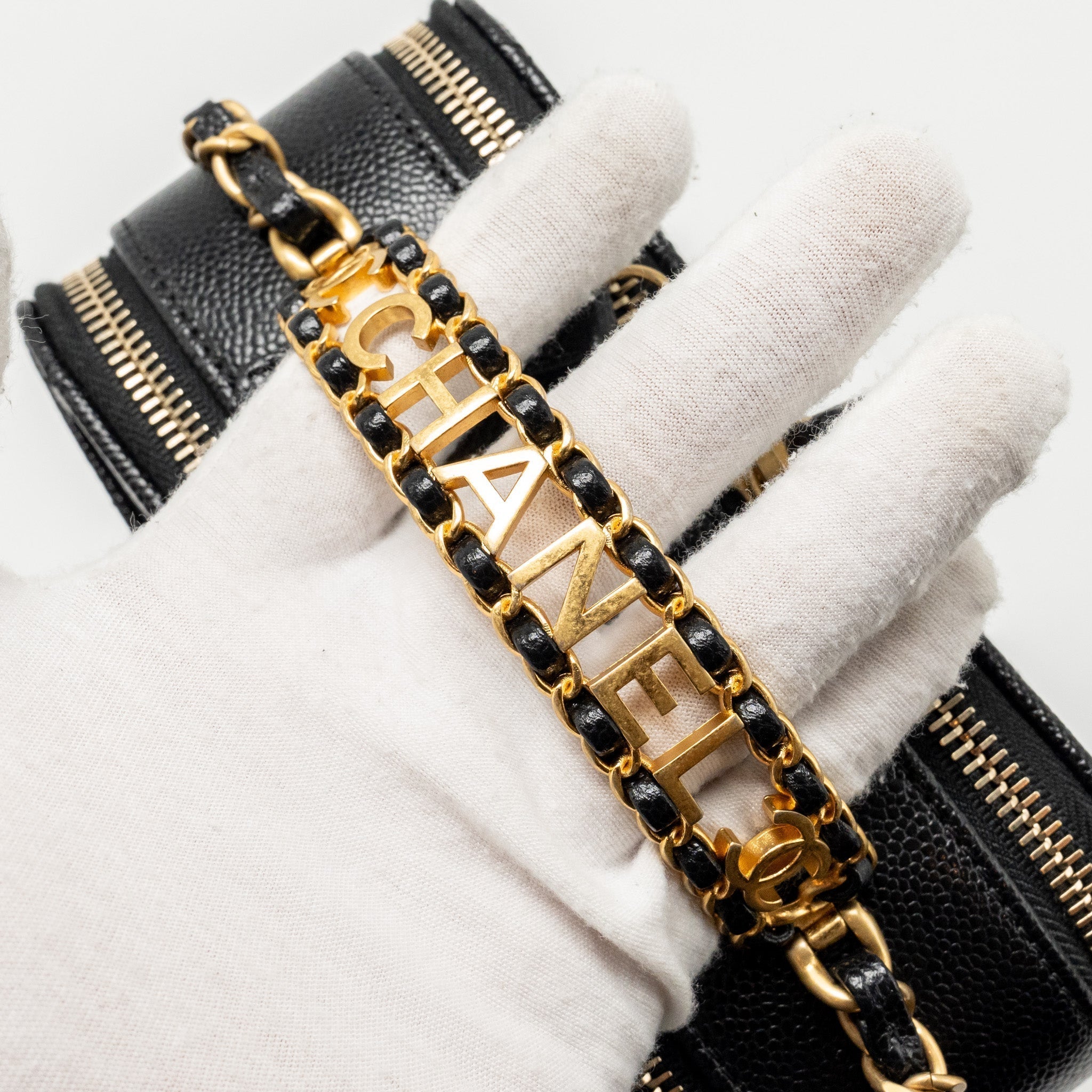 chanel-logo-detailed-handle-mini-pick-me-up-vanity-case-caviar-black-ghw-microchip
