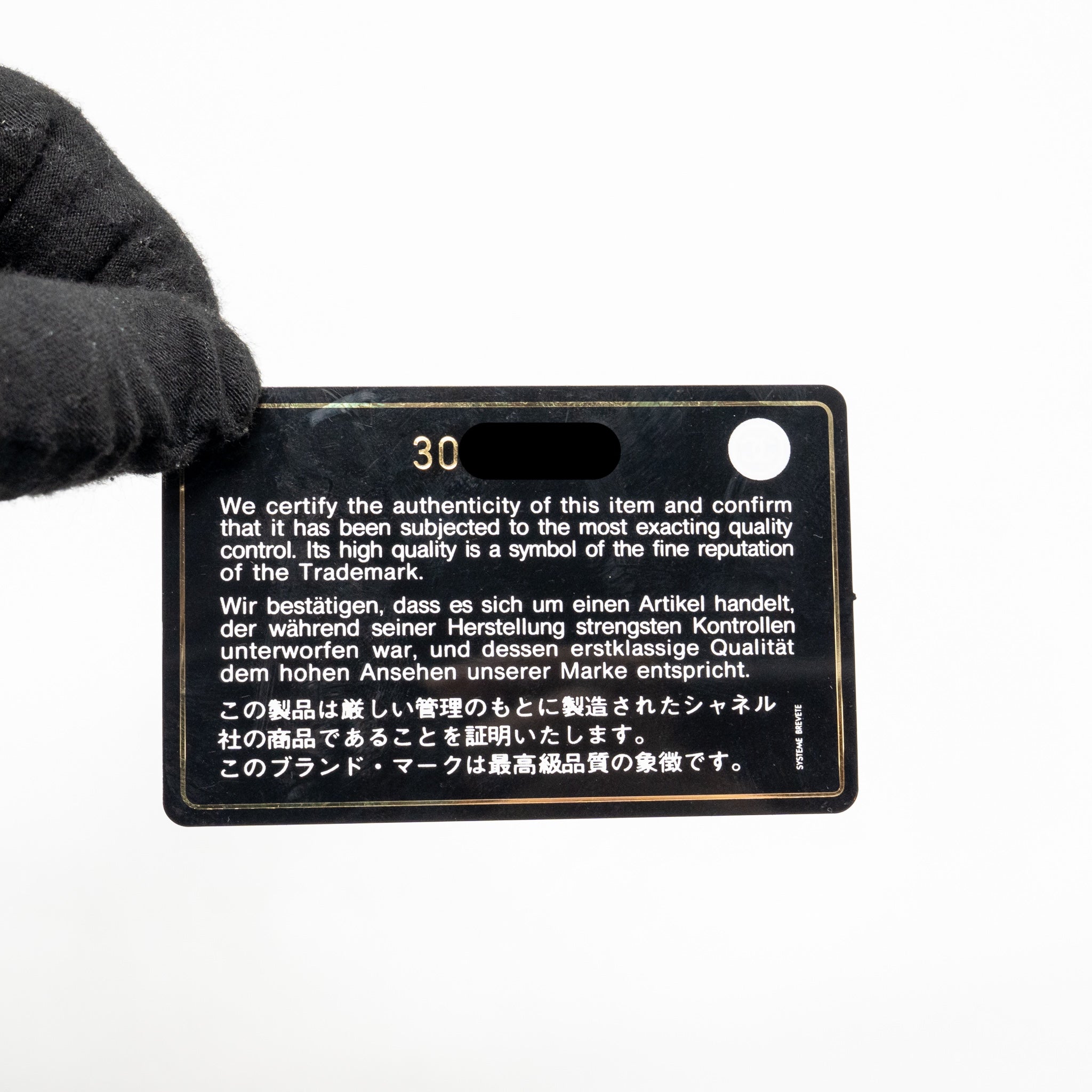 chanel-long-vanity-case-with-chain-lambskin-black-lghw