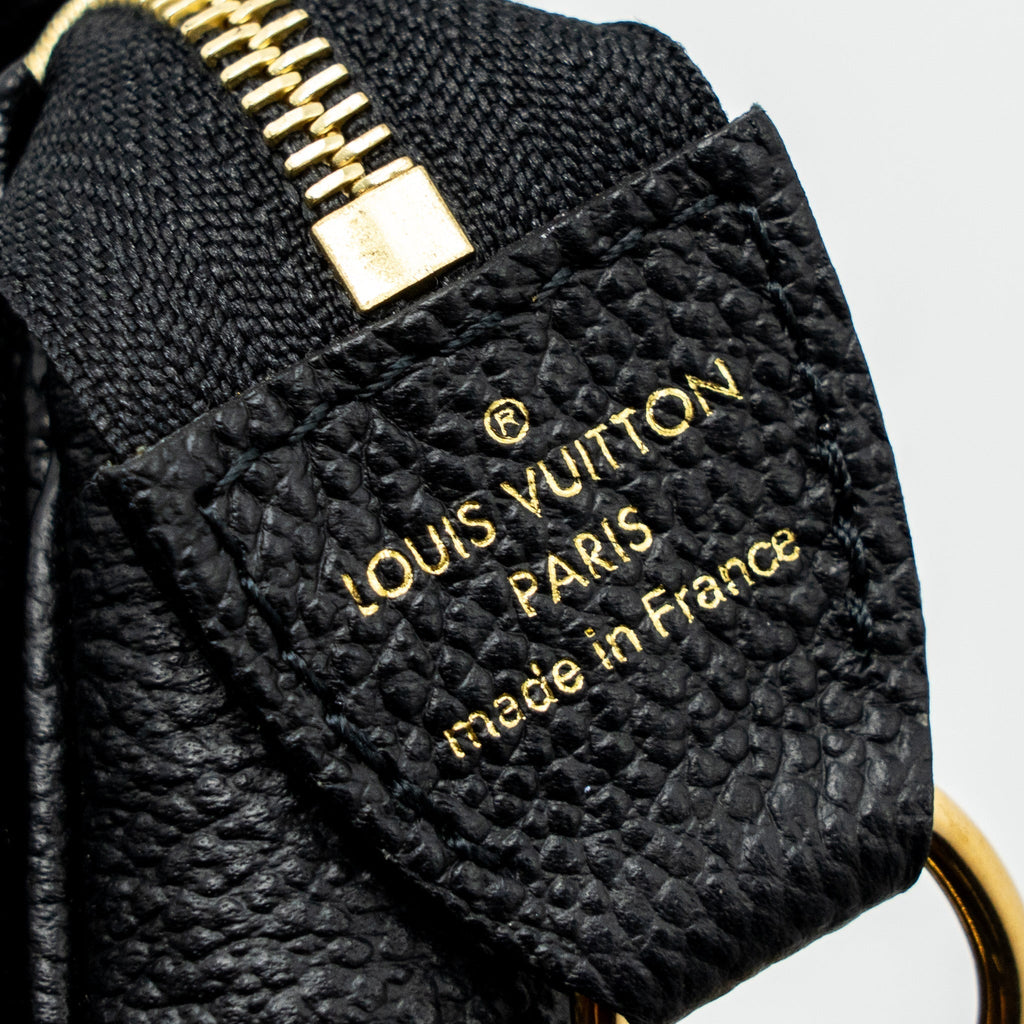 louis-vuitton-mini-pochette-accessories-bicolour-monogram-empreinte-leather-ghw-new-version