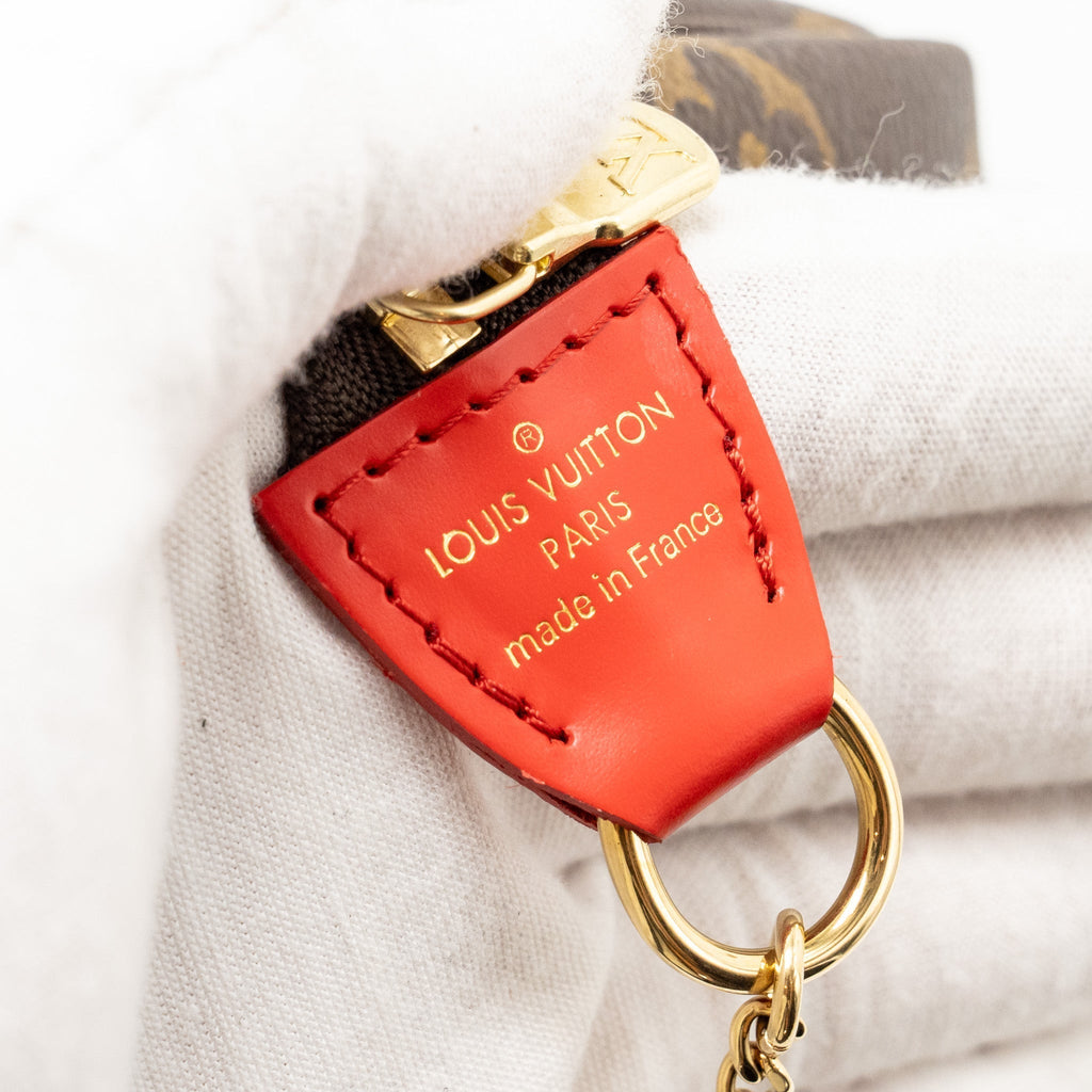 louis-vuitton-2020-mini-pochette-2020-christmas-animation-bumper-cars-monogram-canvas-ghw