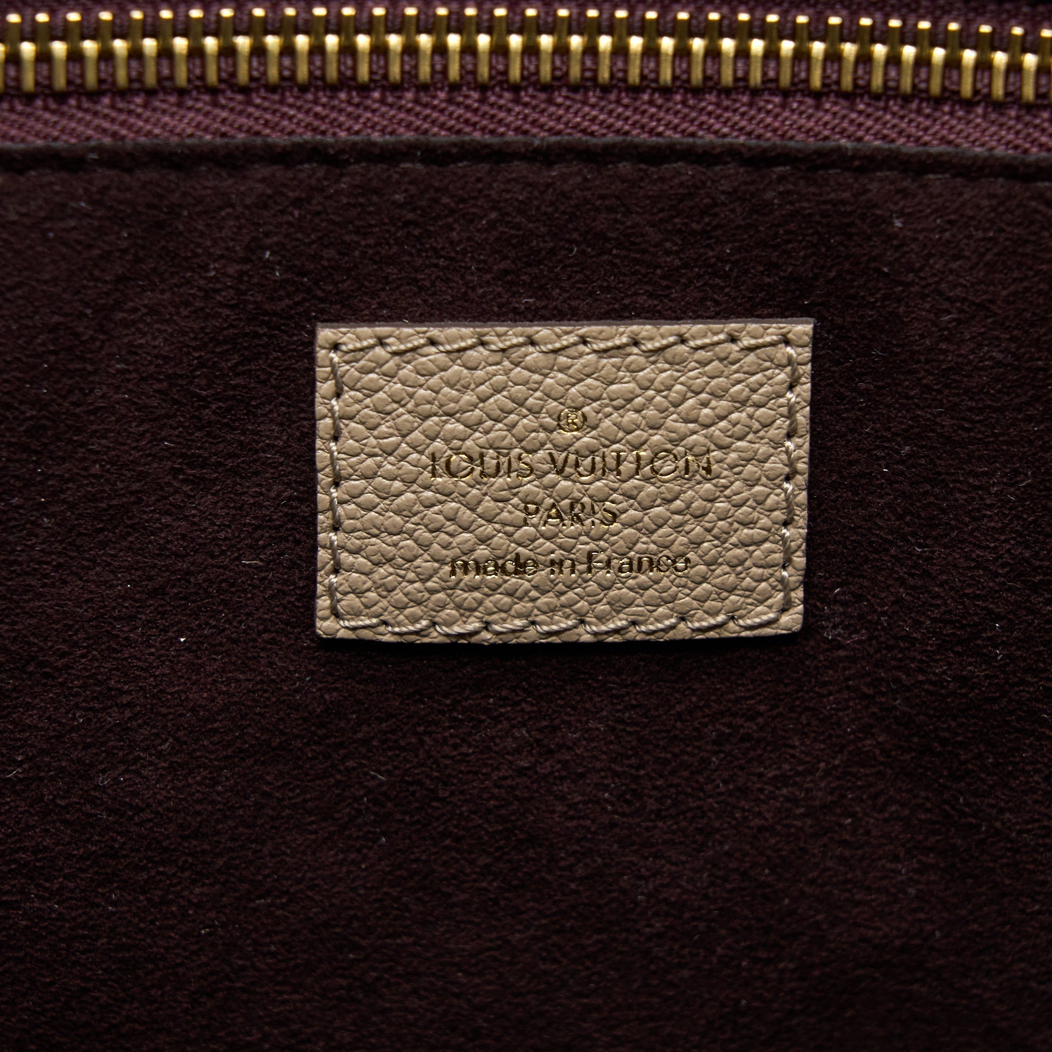 louis-vuitton-neverfull-mm-monogram-empreinte-leather-tourterelle-ghw