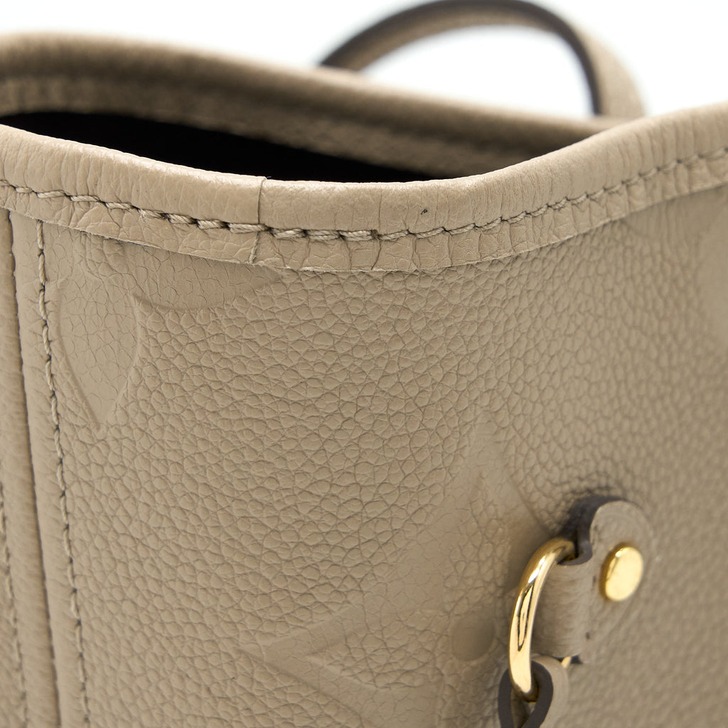 louis-vuitton-neverfull-mm-monogram-empreinte-leather-tourterelle-ghw