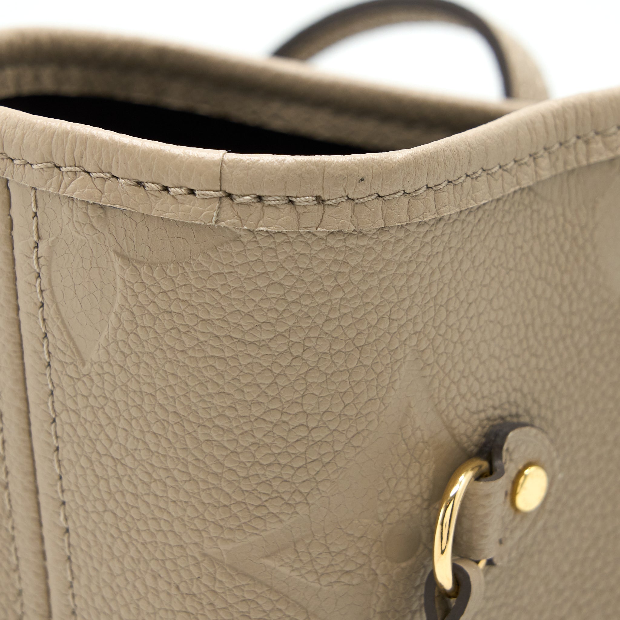 louis-vuitton-neverfull-mm-monogram-empreinte-leather-tourterelle-ghw
