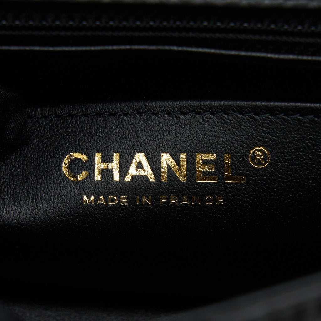 chanel-mini-2-55-reissue-flap-bag-aged-calfskin-black-brushed-ghw-microchip-1